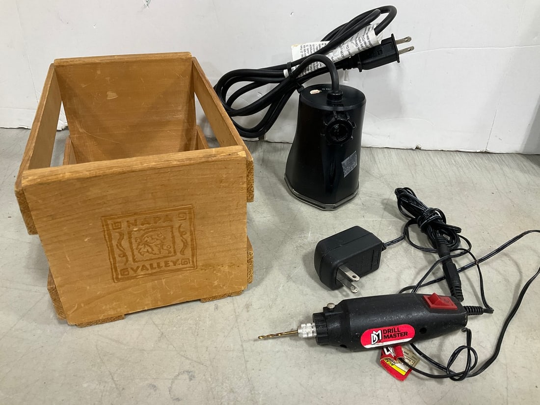 Multi colored strobe light and small wooden crate: Multi colored strobe light and small wooden crate