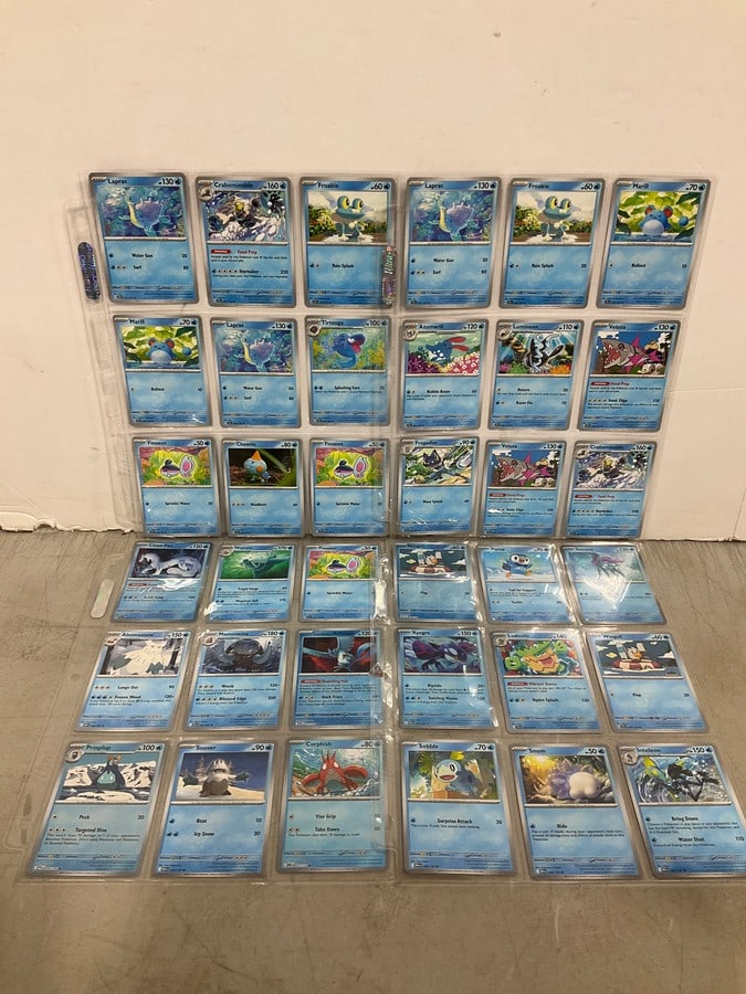 Various Pokemon cards in collector sheets: Various Pokemon cards in collector sheets
