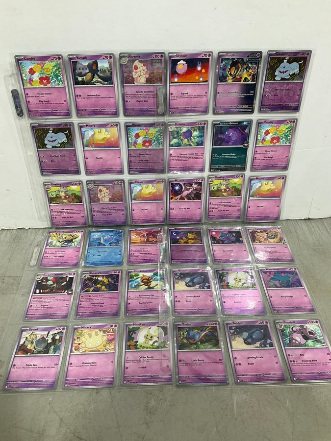 Various Pokemon cards in collector sheets (1 of 1)