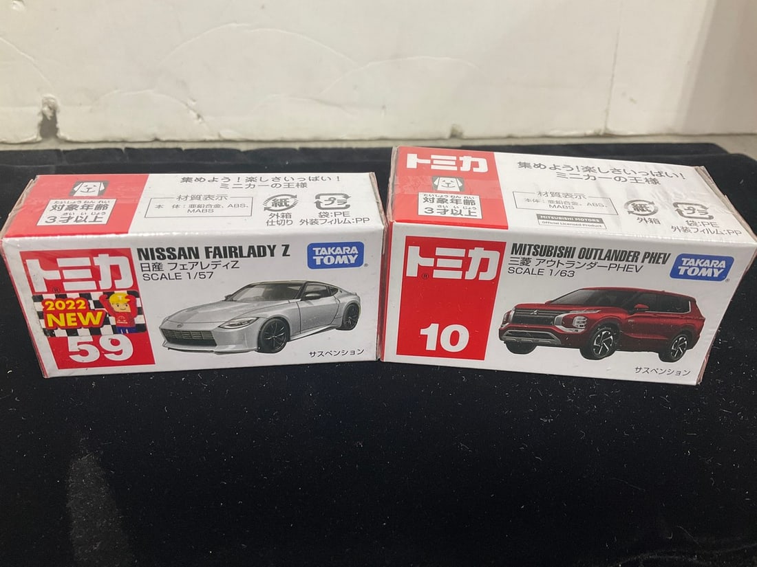Tomy Nissan Fairlady Z and Mitsubishi Outlander Phev Model Cars *new in box*: Tomy Nissan Fairlady Z and Mitsubishi Outlander Phev Model Cars *new in box*
