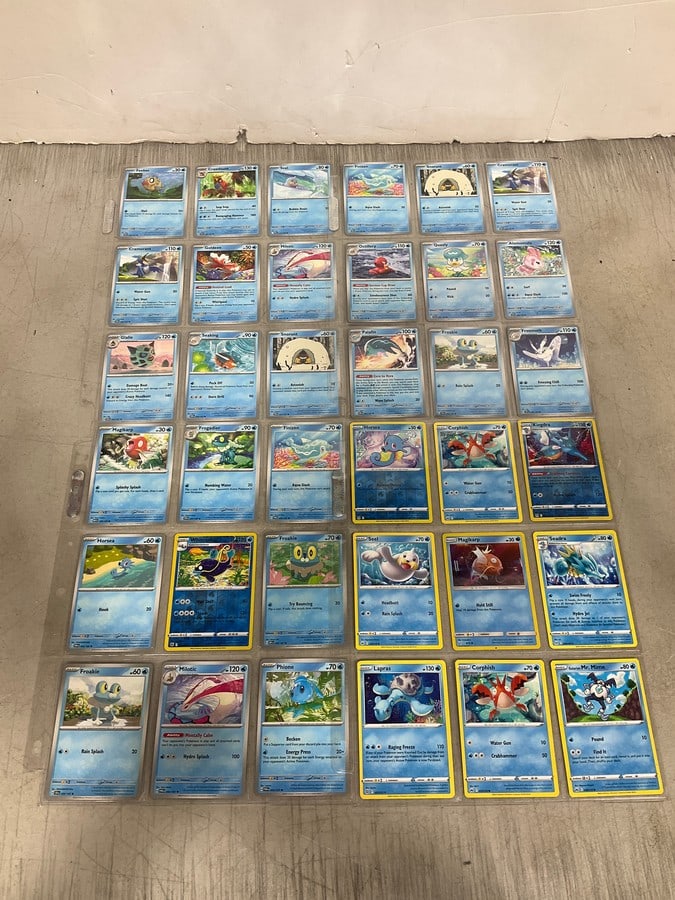 Various Pokemon cards in collector sheets: Various Pokemon cards in collector sheets