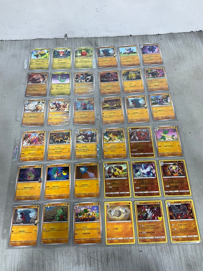 Various Pokemon cards in collector sheets: Various Pokemon cards in collector sheets