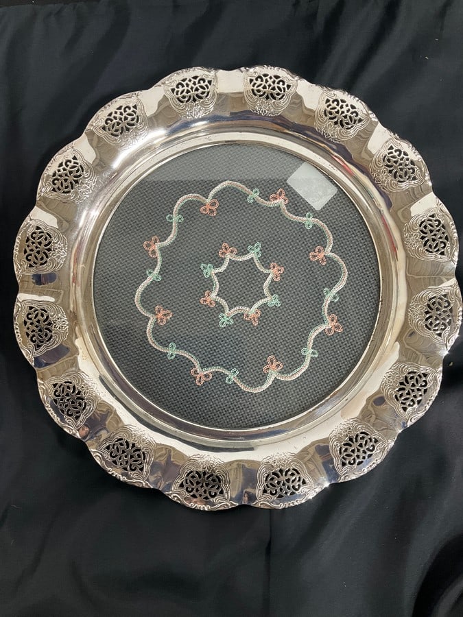 1940's round glass tray with embroidery and reticulated silverplated border(14in.across): 1940's round glass tray with embroidery and reticulated silverplated border(14in.across)
