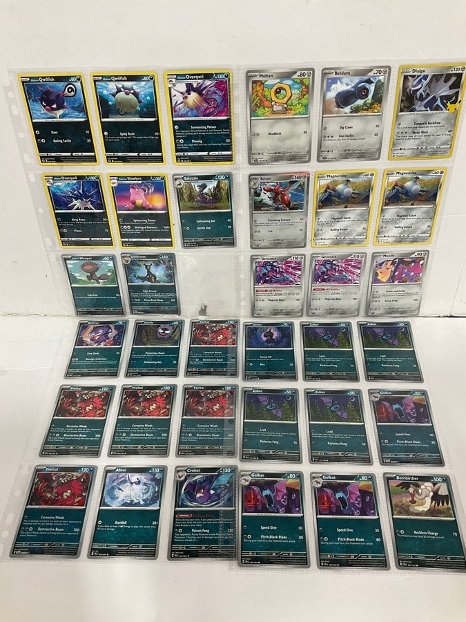 Various Pokemon cards in collector sheets (1 of 1)