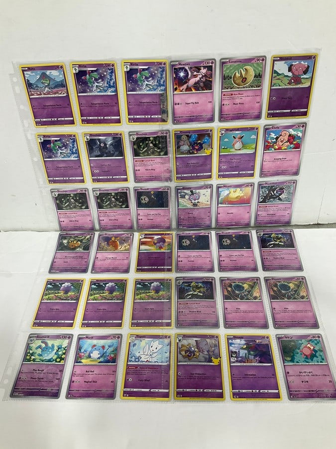 Various Pokemon cards in collector sheets (1 of 1)