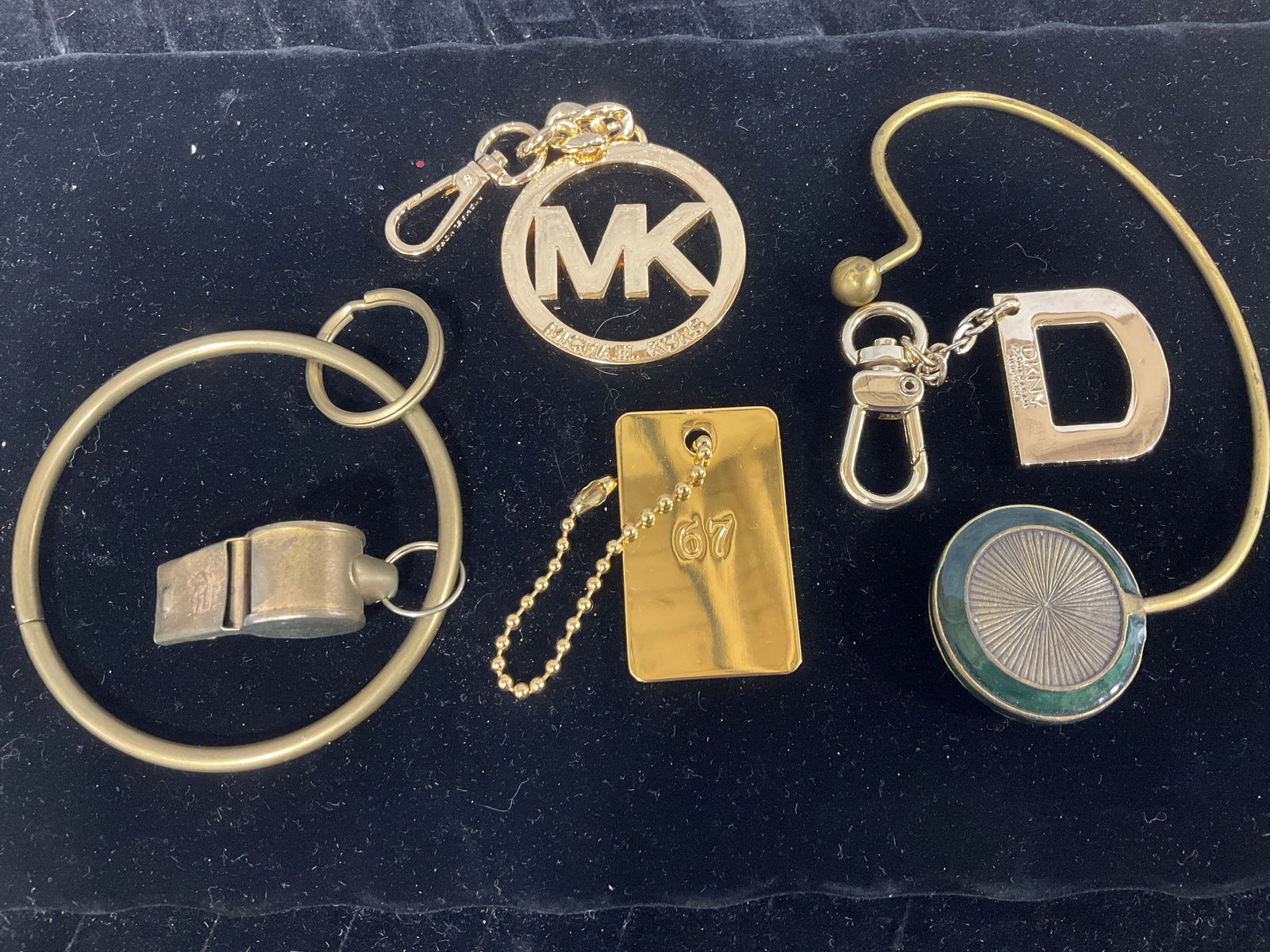 Various keychains/whistle: Various keychains/whistle