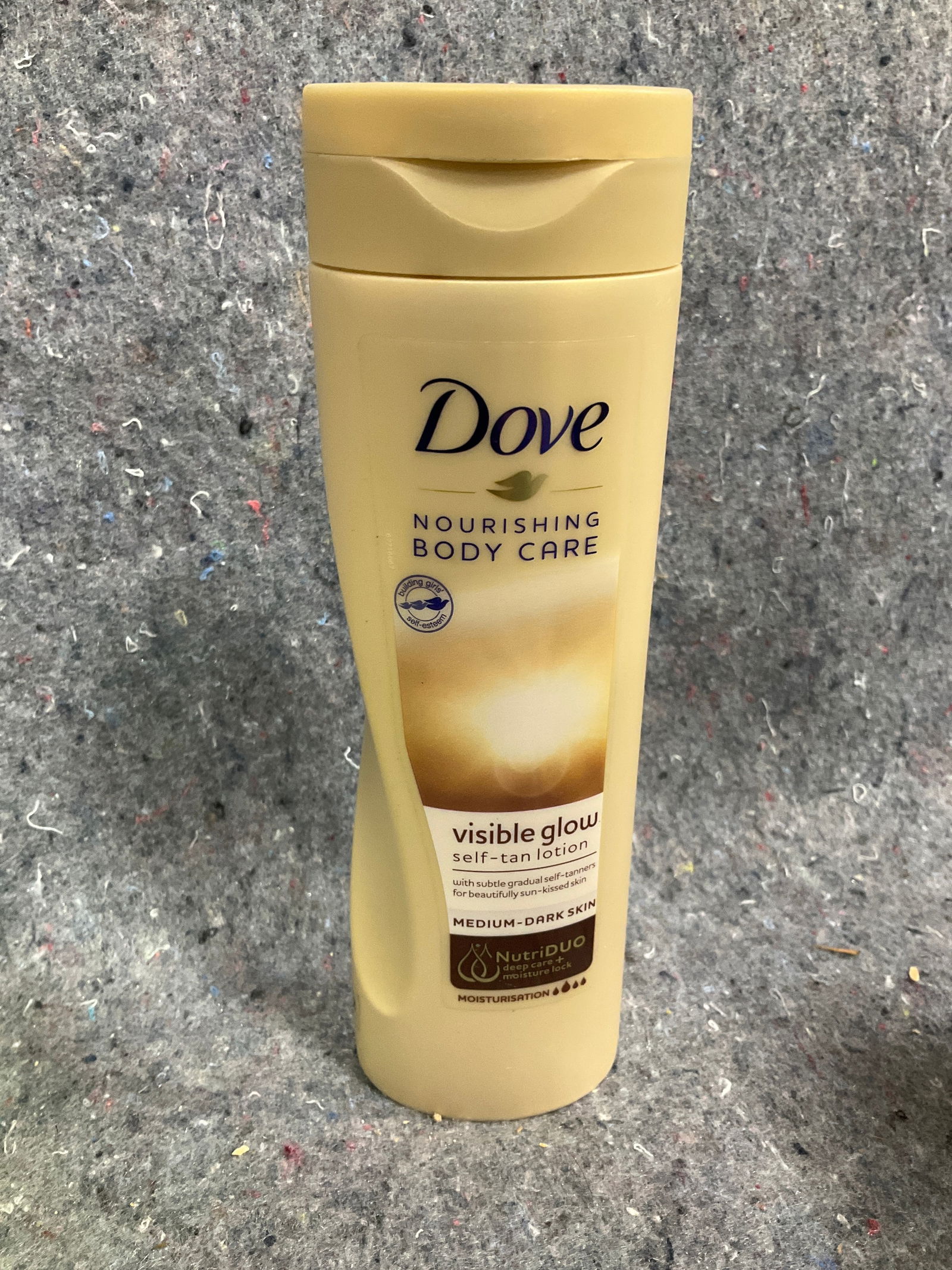 Dove nourishing body care self tan lotion(250mL): Dove nourishing body care self tan lotion(250mL)