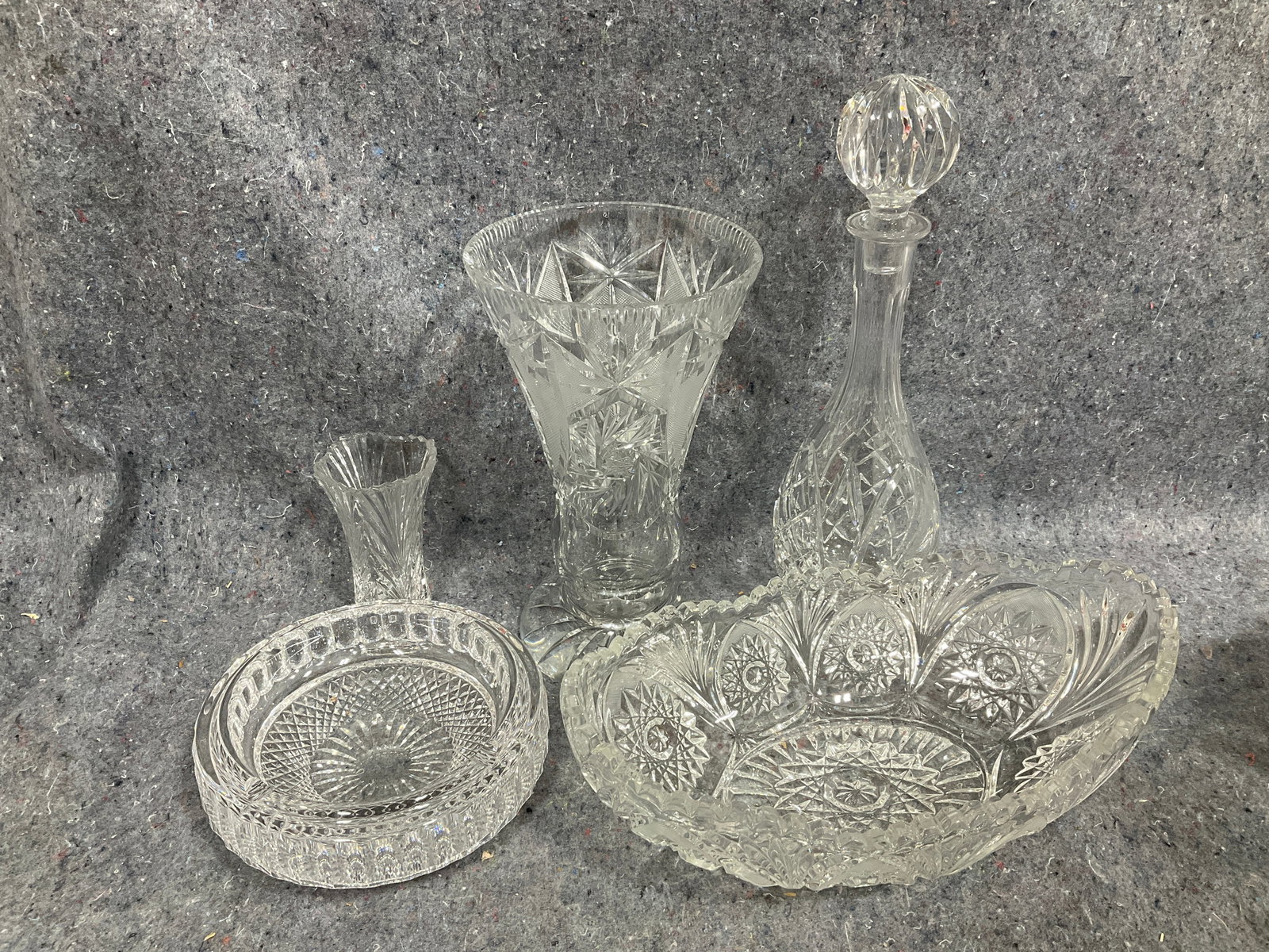 Crystal cut bowl, vases, and decanter(14in tallest): Crystal cut bowl, vases, and decanter(14in tallest)