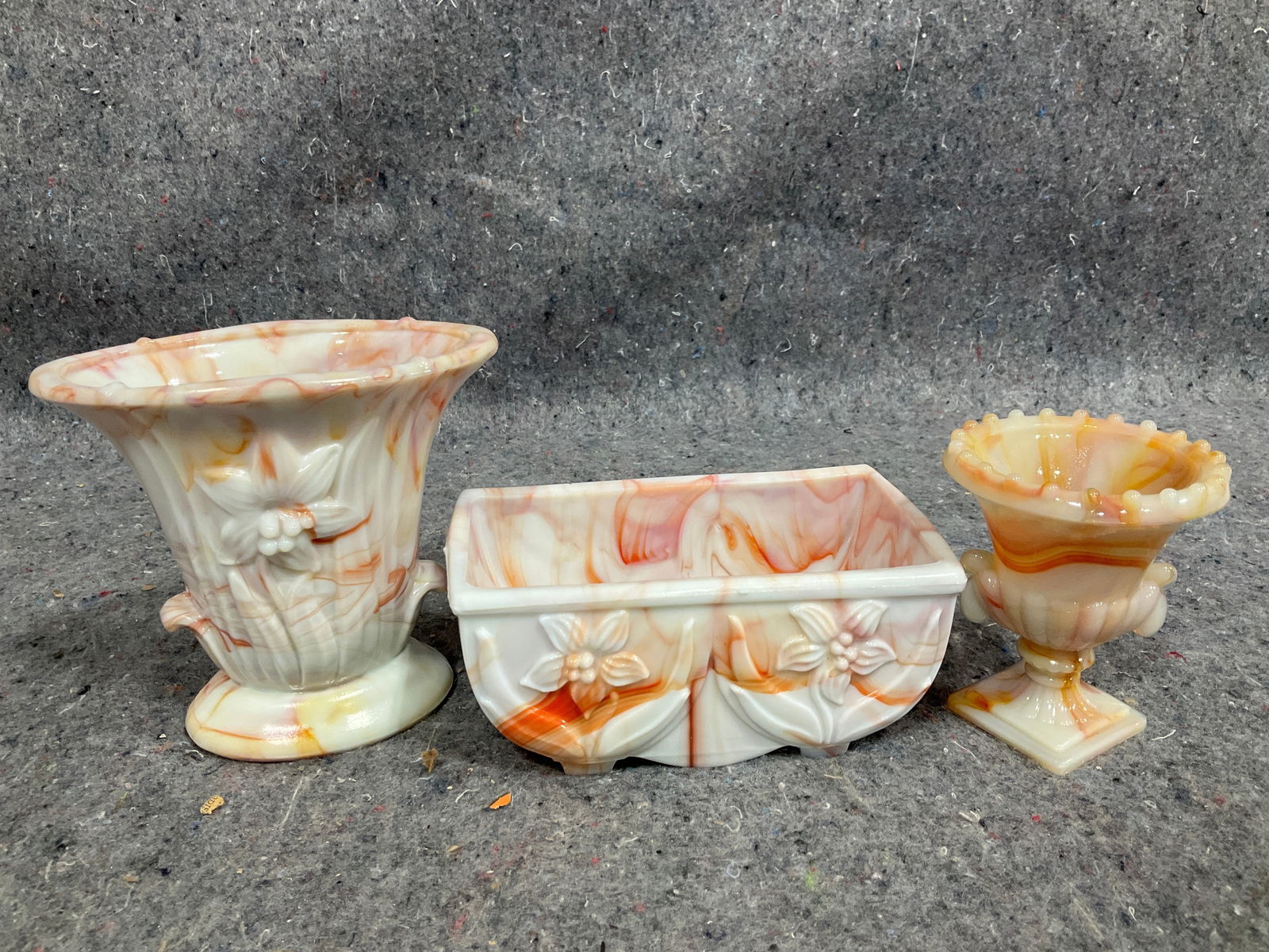 Marbled orange slag glass vase and other items(tallest 4.5in): Marbled orange slag glass vase and other items(tallest 4.5in)