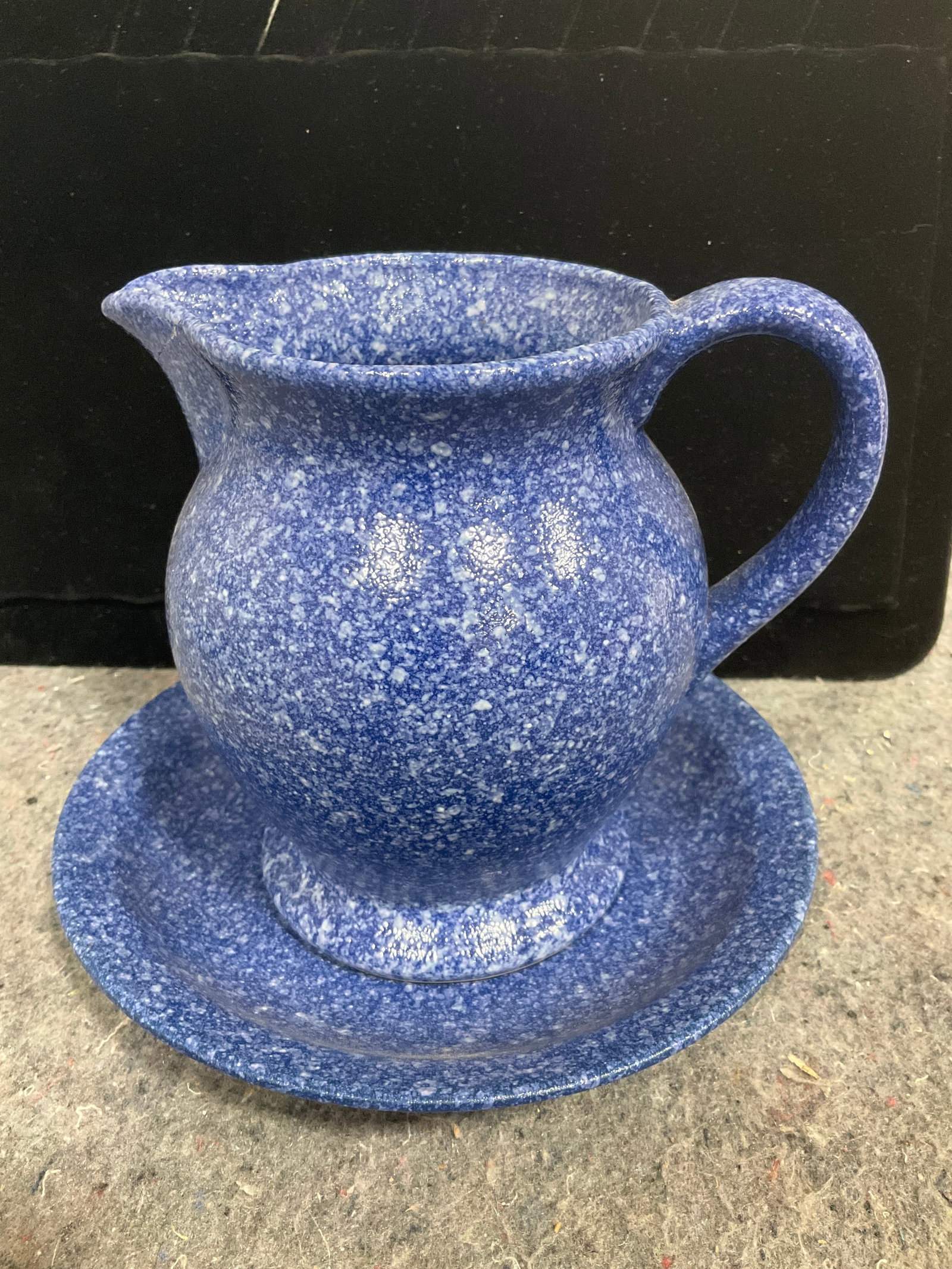 Vintage blue and white speckled stoneware pitcher with plate(6in tall) (1 of 1)