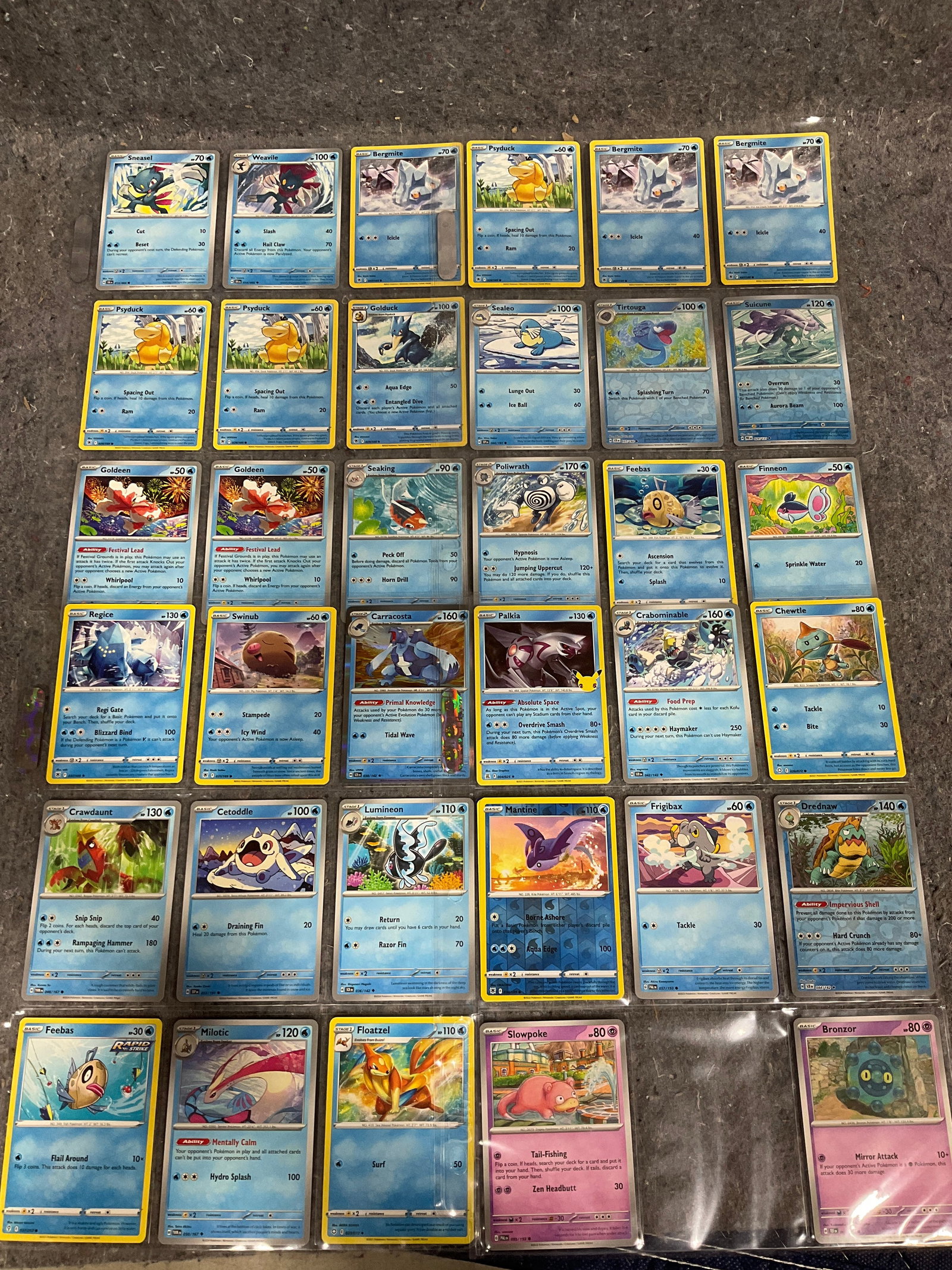 Various Pokemon cards in collector sheets (1 of 1)