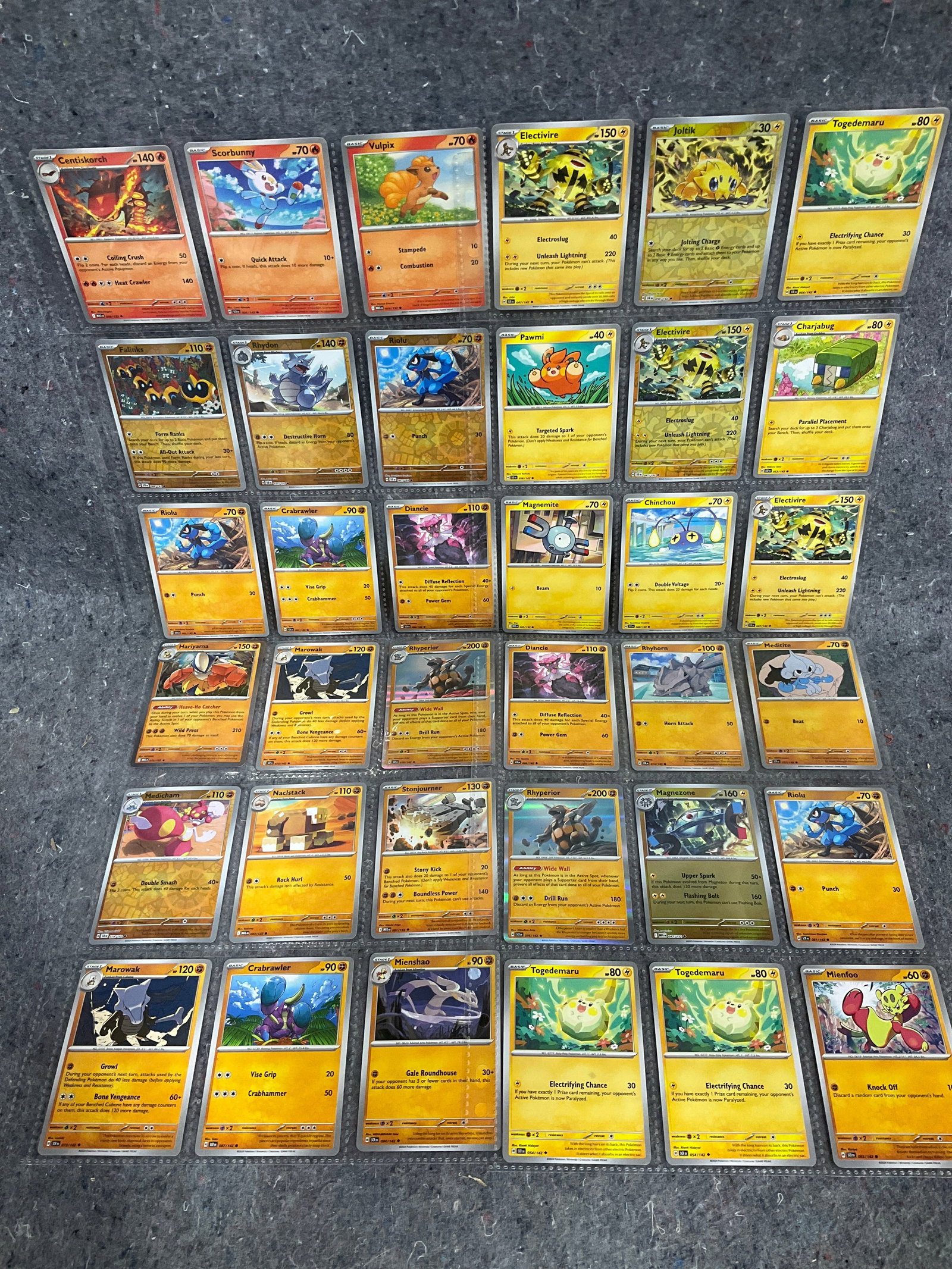 Various Pokemon cards in collector sheets (1 of 1)