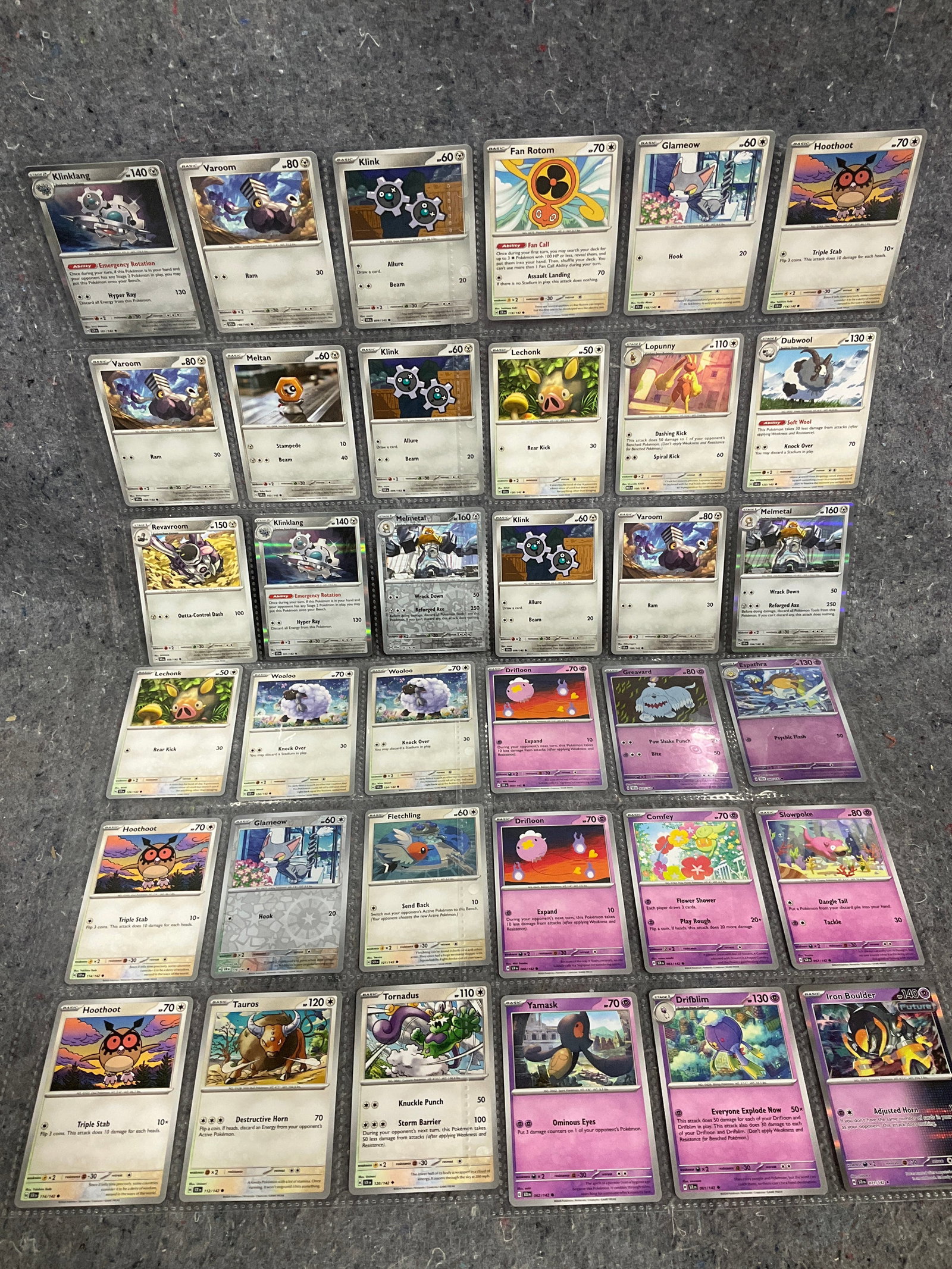 Various Pokemon cards in collector sheets (1 of 1)