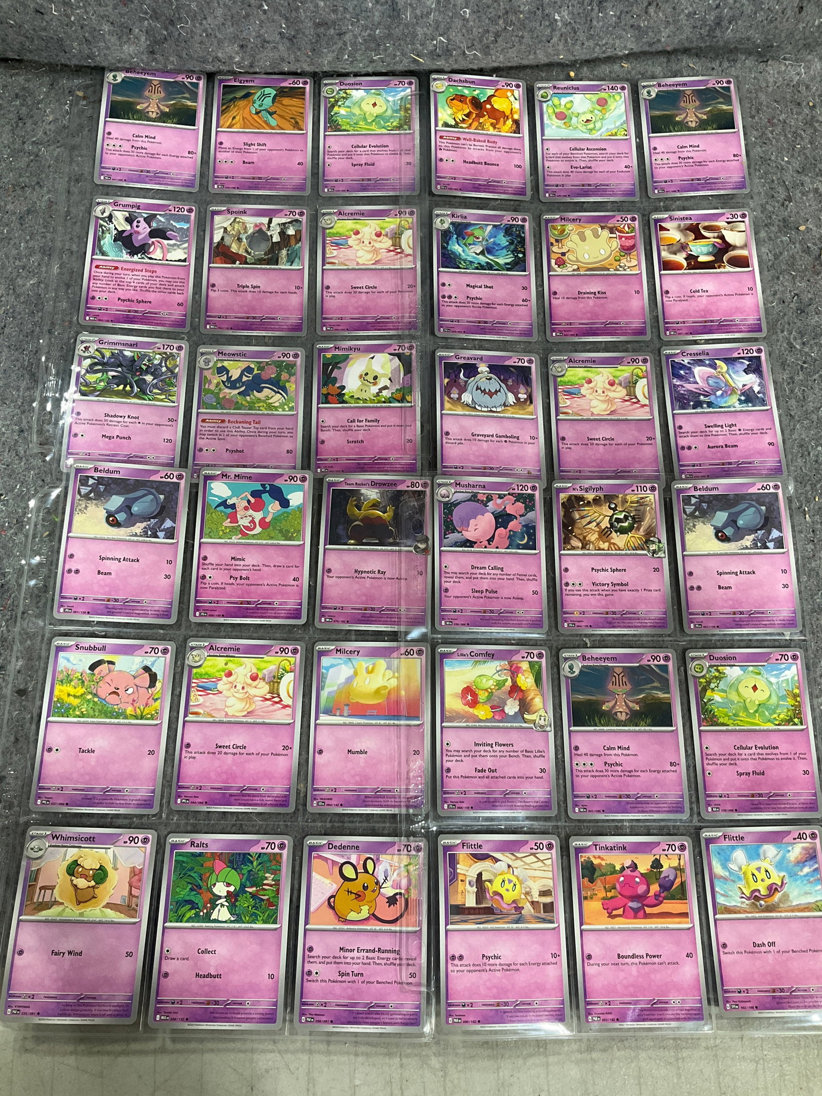 Various Pokemon cards in collector sheets: Various Pokemon cards in collector sheets