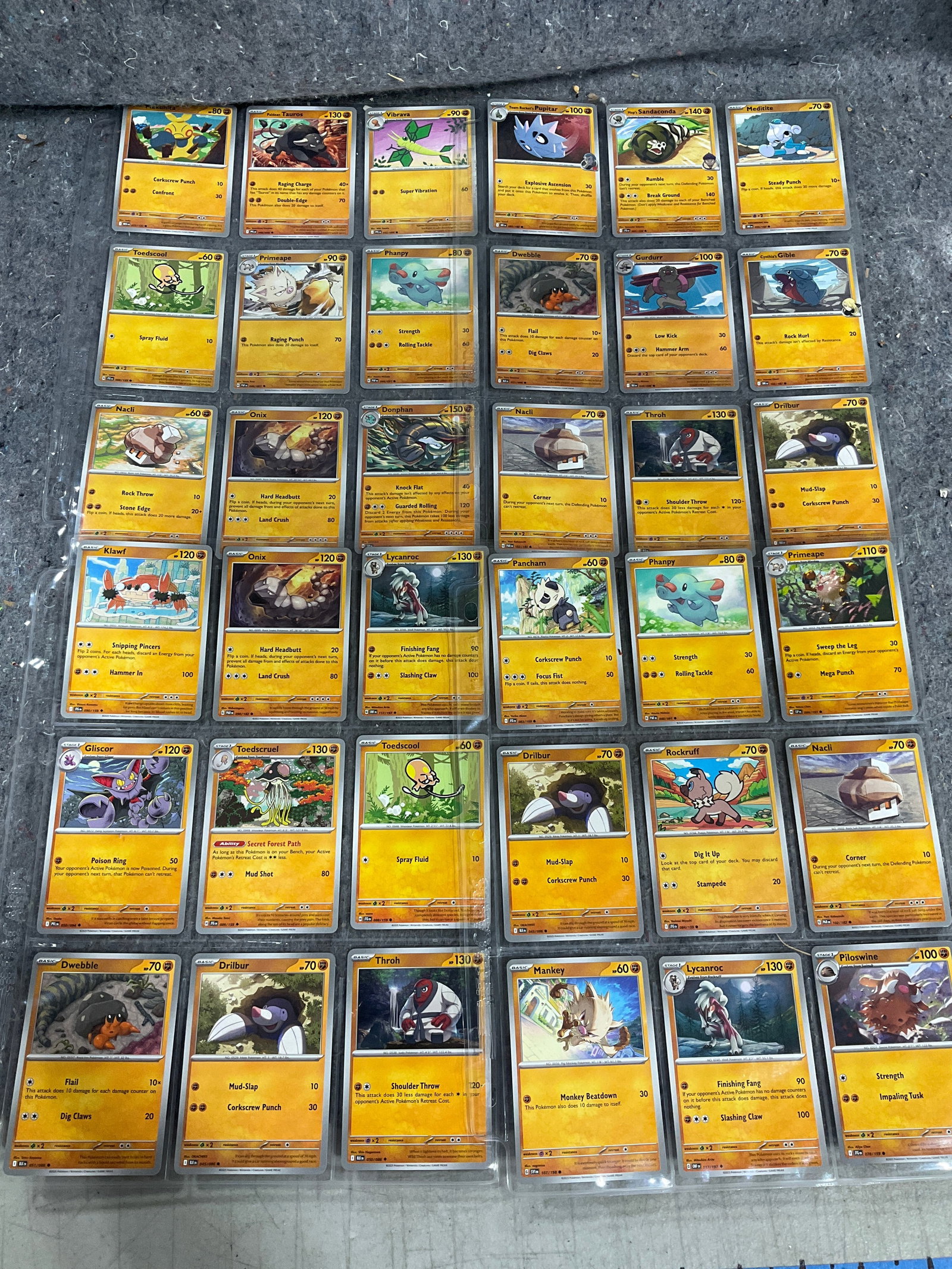 Various Pokemon cards in collector sheets: Various Pokemon cards in collector sheets