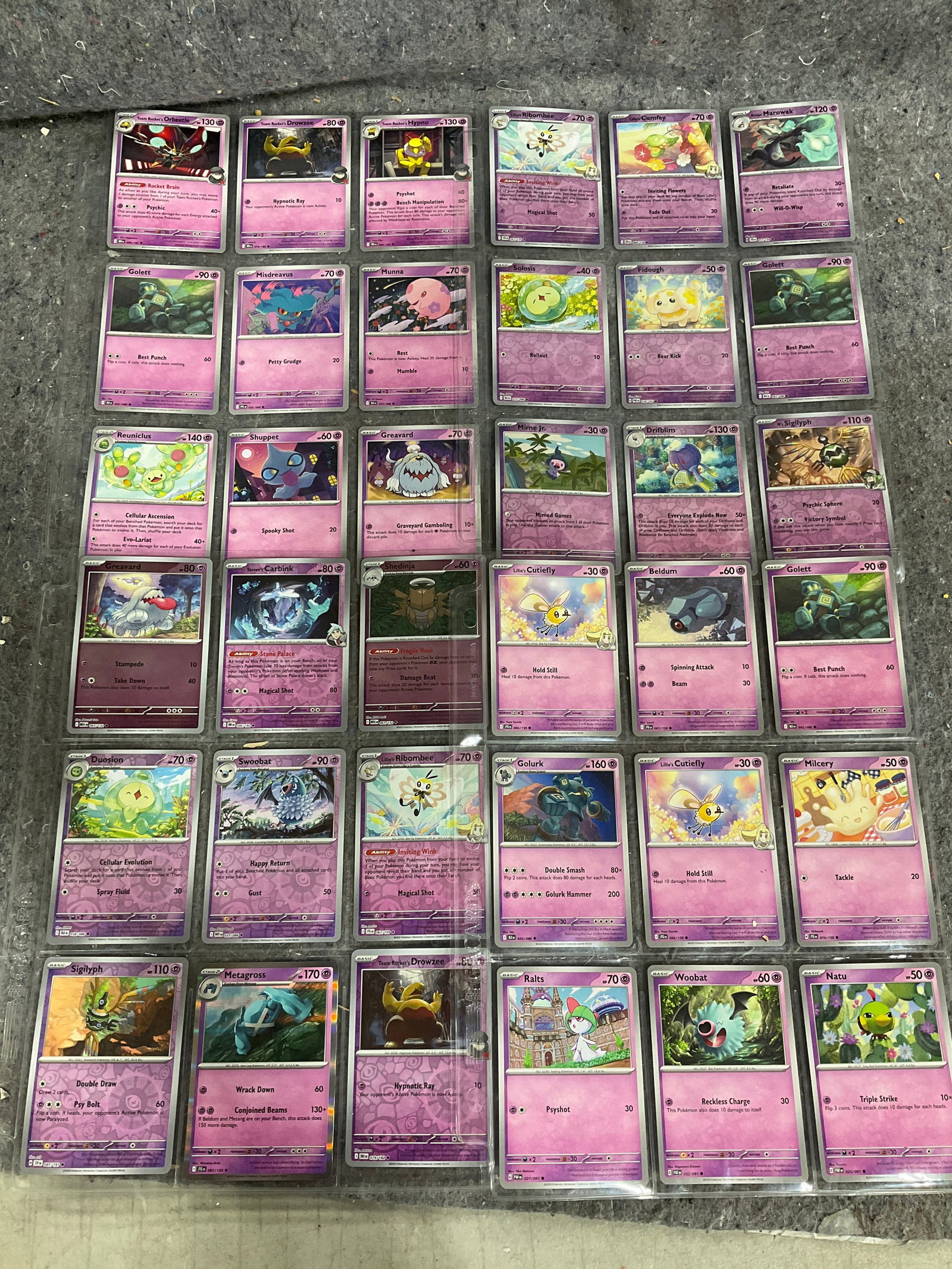 Various Pokemon cards in collector sheets: Various Pokemon cards in collector sheets