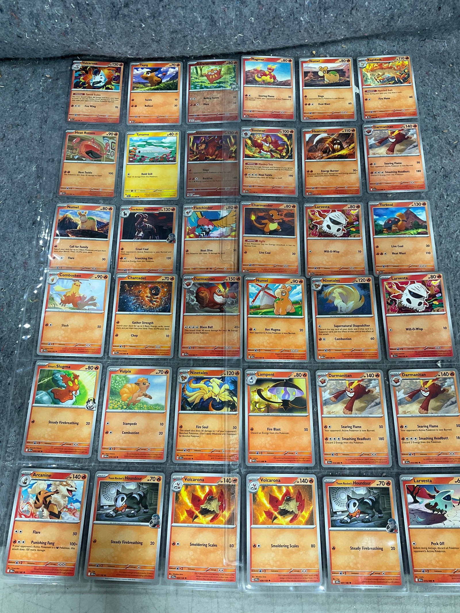 Various Pokemon cards in collector sheets: Various Pokemon cards in collector sheets