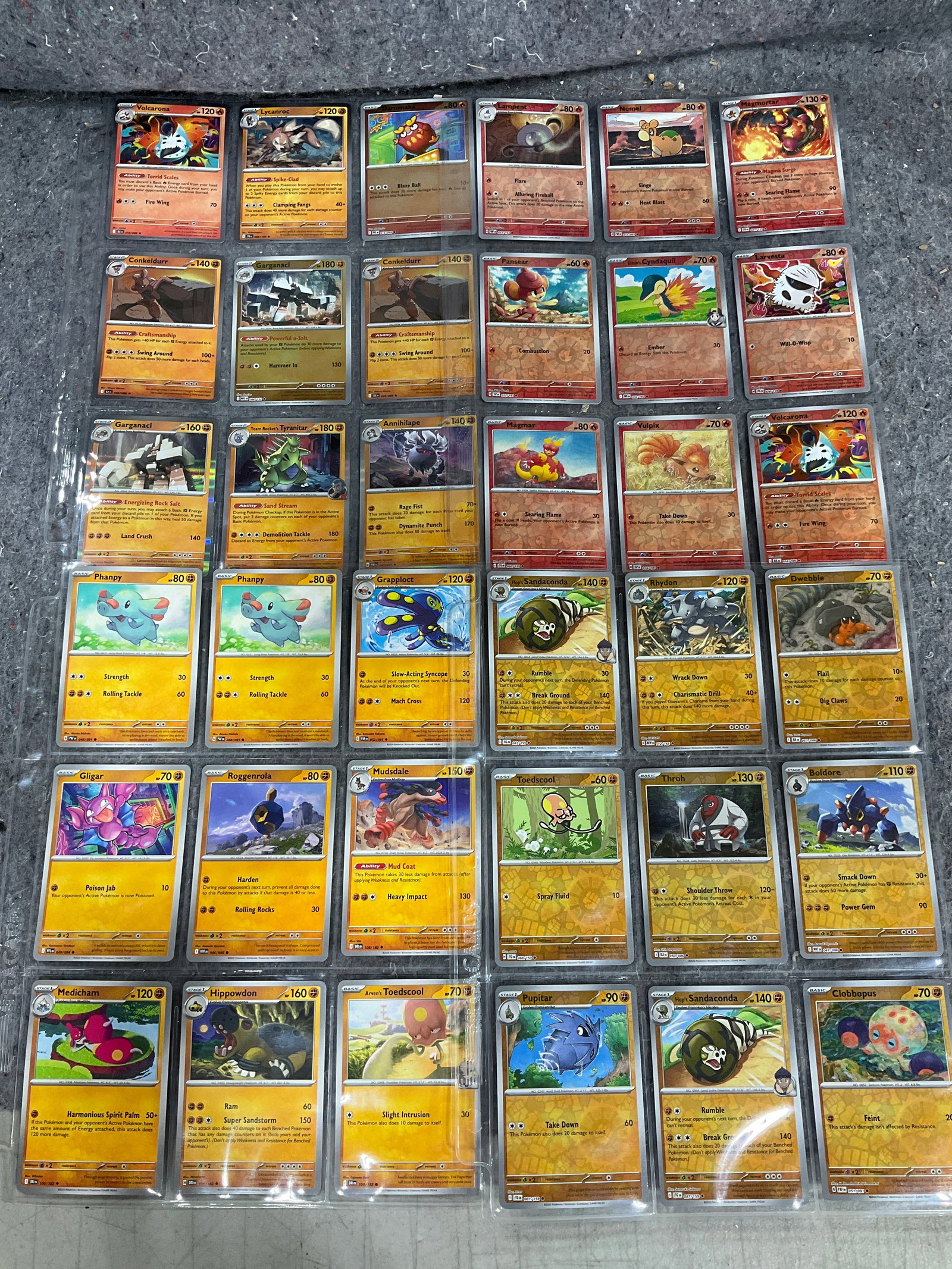 Various Pokemon cards in collector sheets: Various Pokemon cards in collector sheets