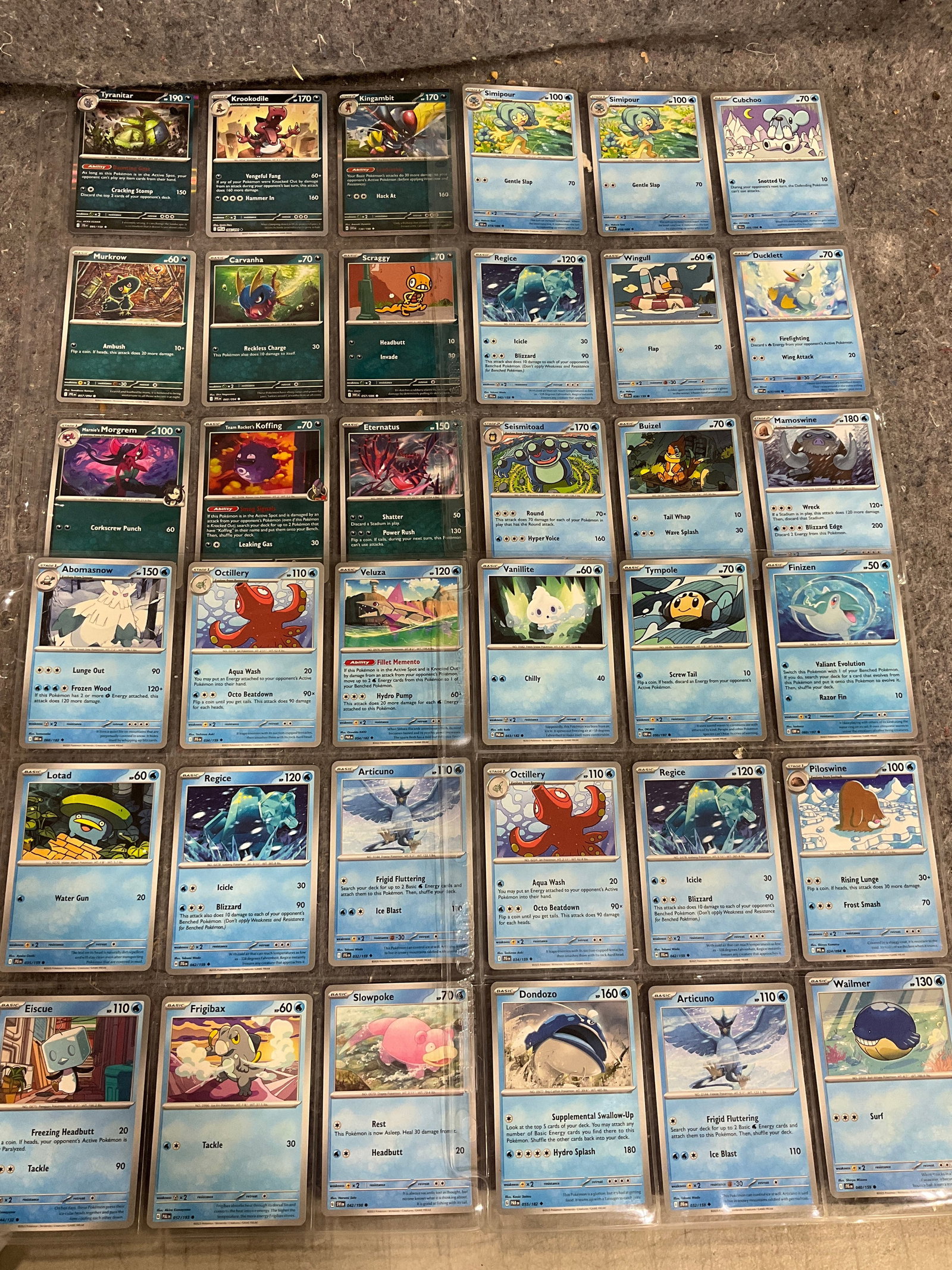 Various Pokemon cards in collector sheets (1 of 1)