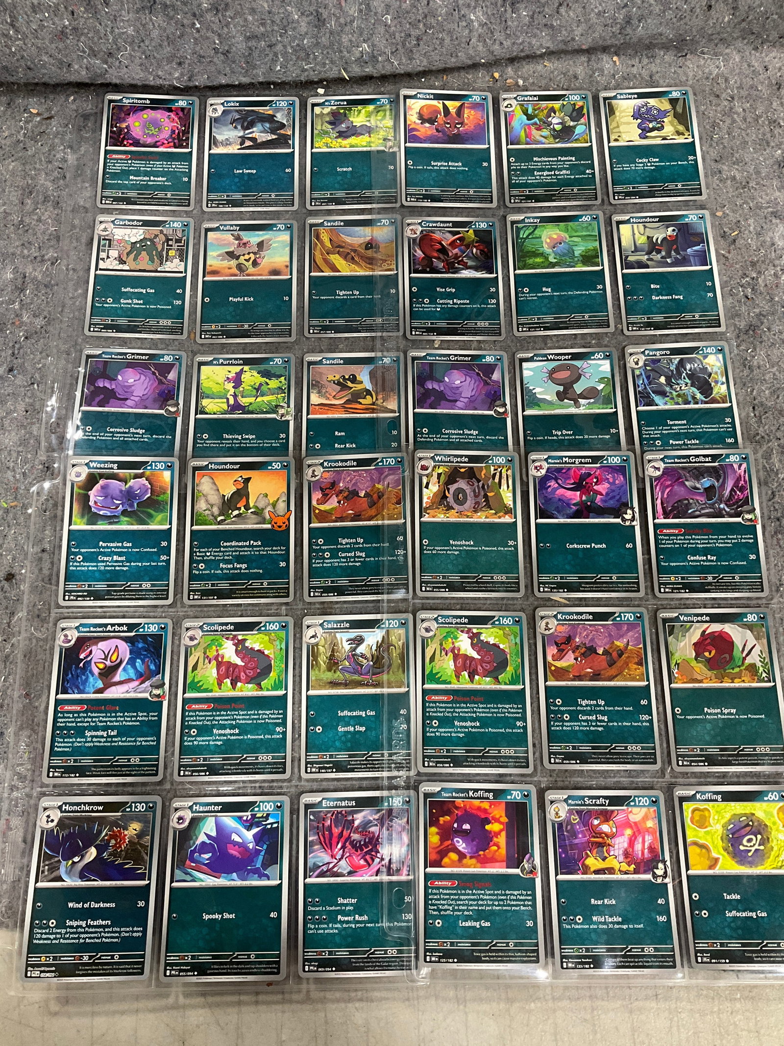 Various Pokemon cards in collector sheets: Various Pokemon cards in collector sheets