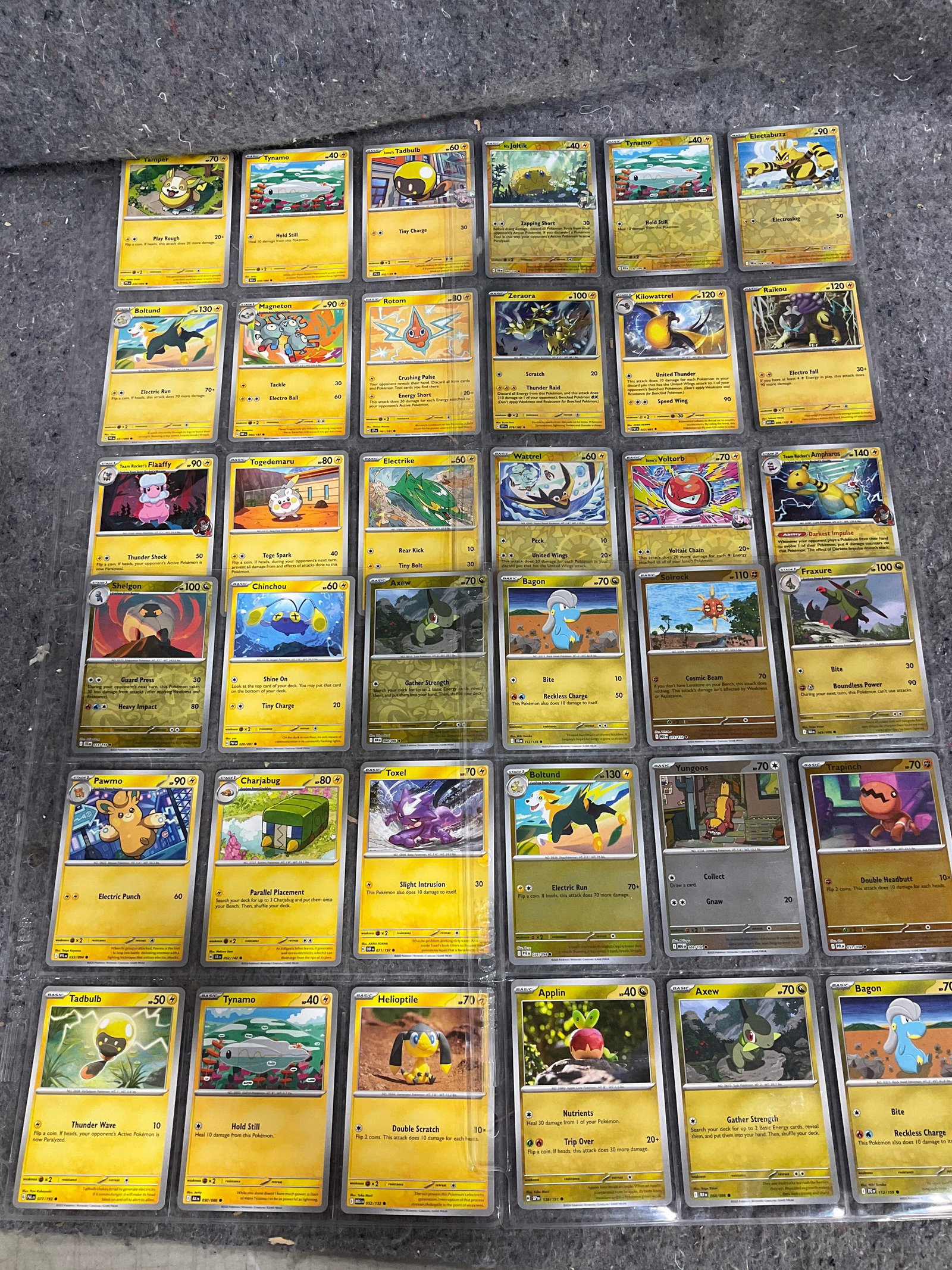 Various Pokemon cards in collector sheets: Various Pokemon cards in collector sheets