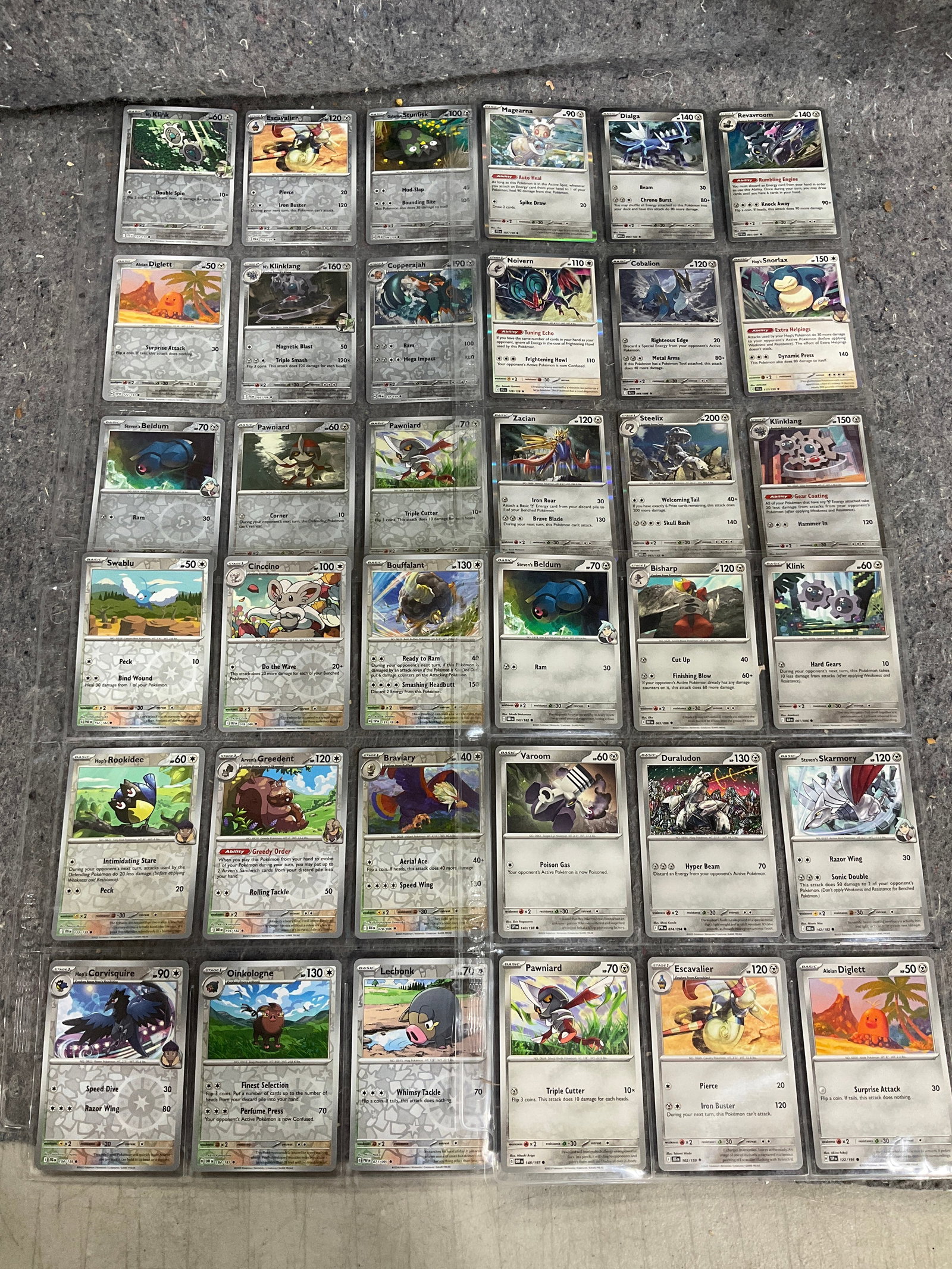 Various Pokemon cards in collector sheets: Various Pokemon cards in collector sheets