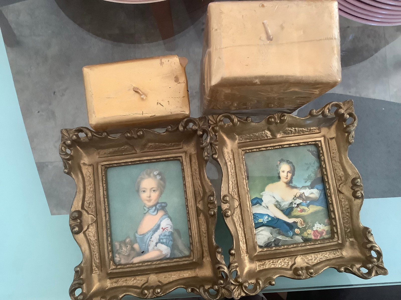 Vintage framed portraits and candles: Vintage framed portraits and candles