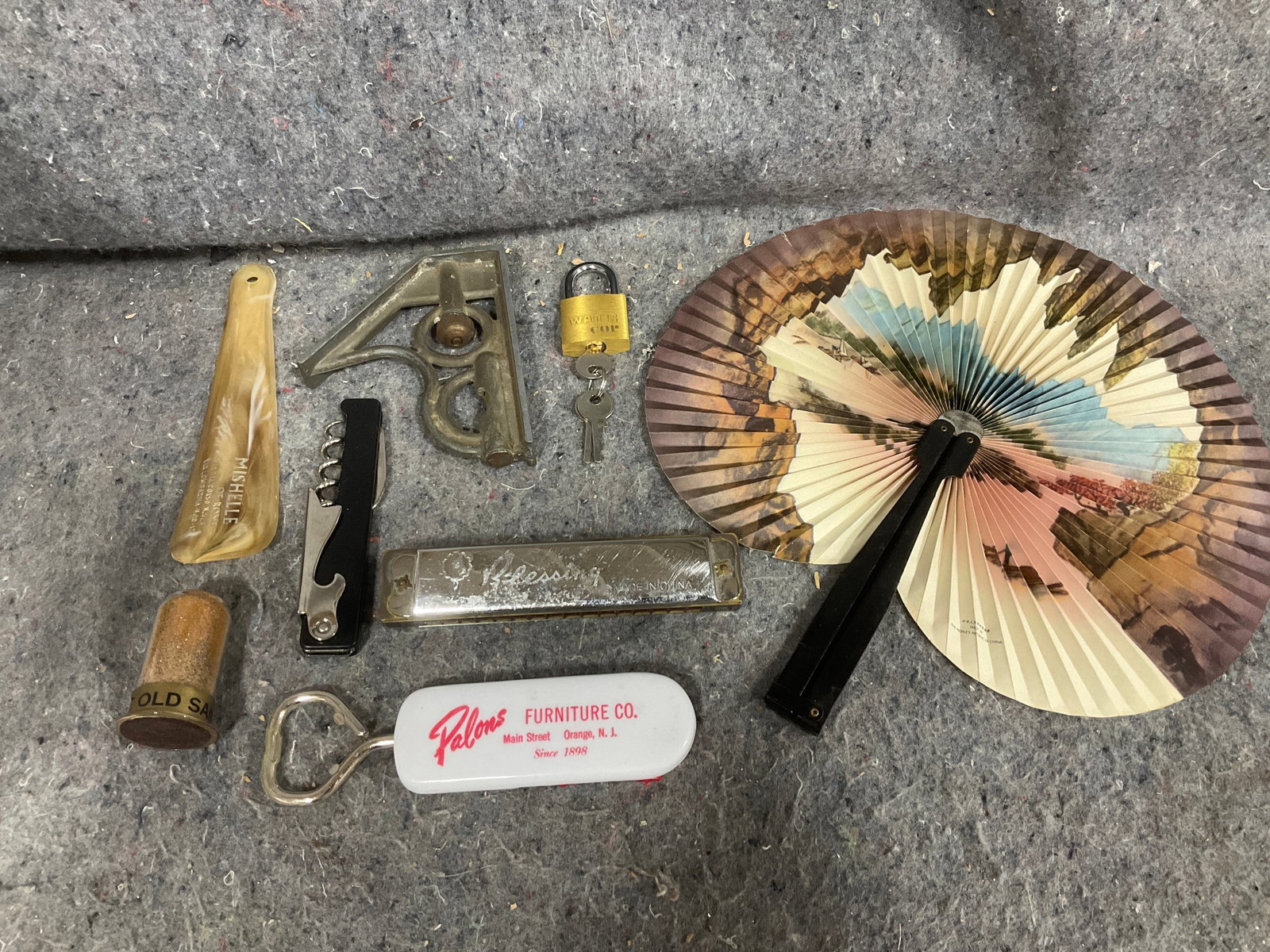 Handmade fan, vintage key and lock, harmonica, and more: Handmade fan, vintage key and lock, harmonica, and more
