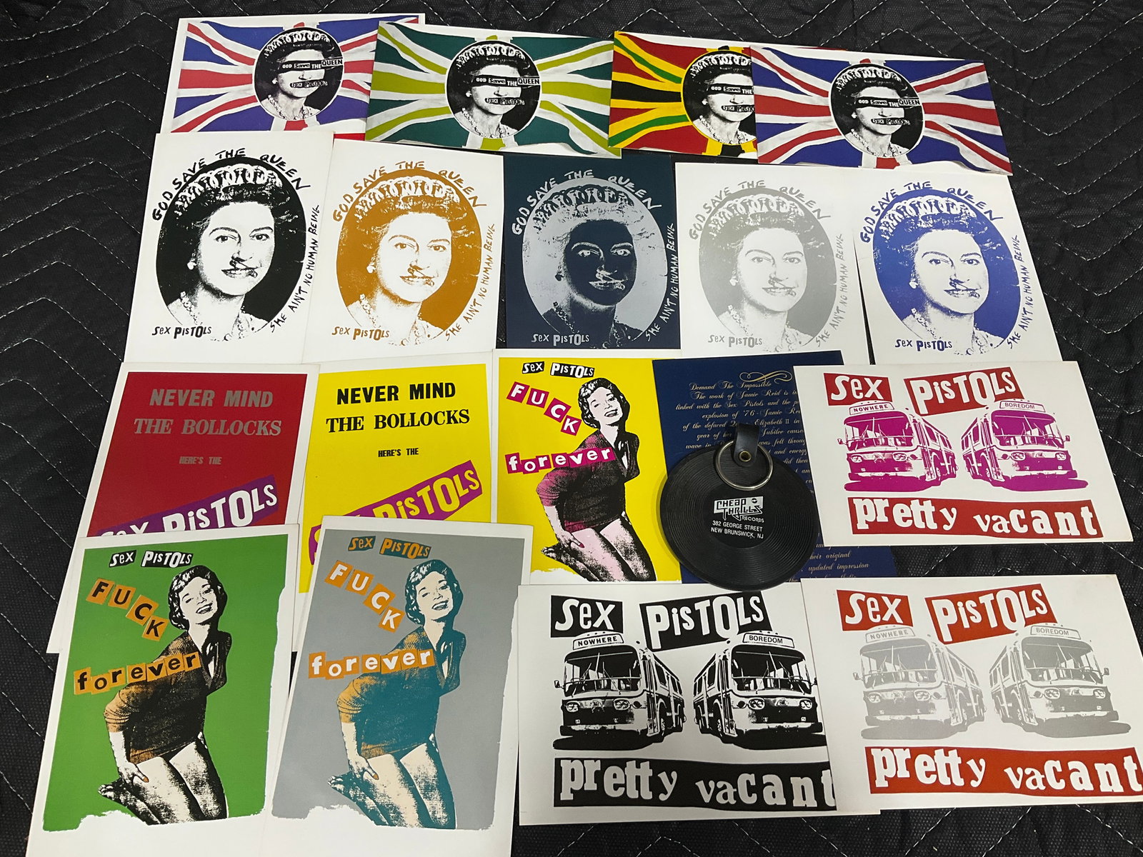 Vintage Sex Pistols promotional postcards and record keychain (1 of 1)