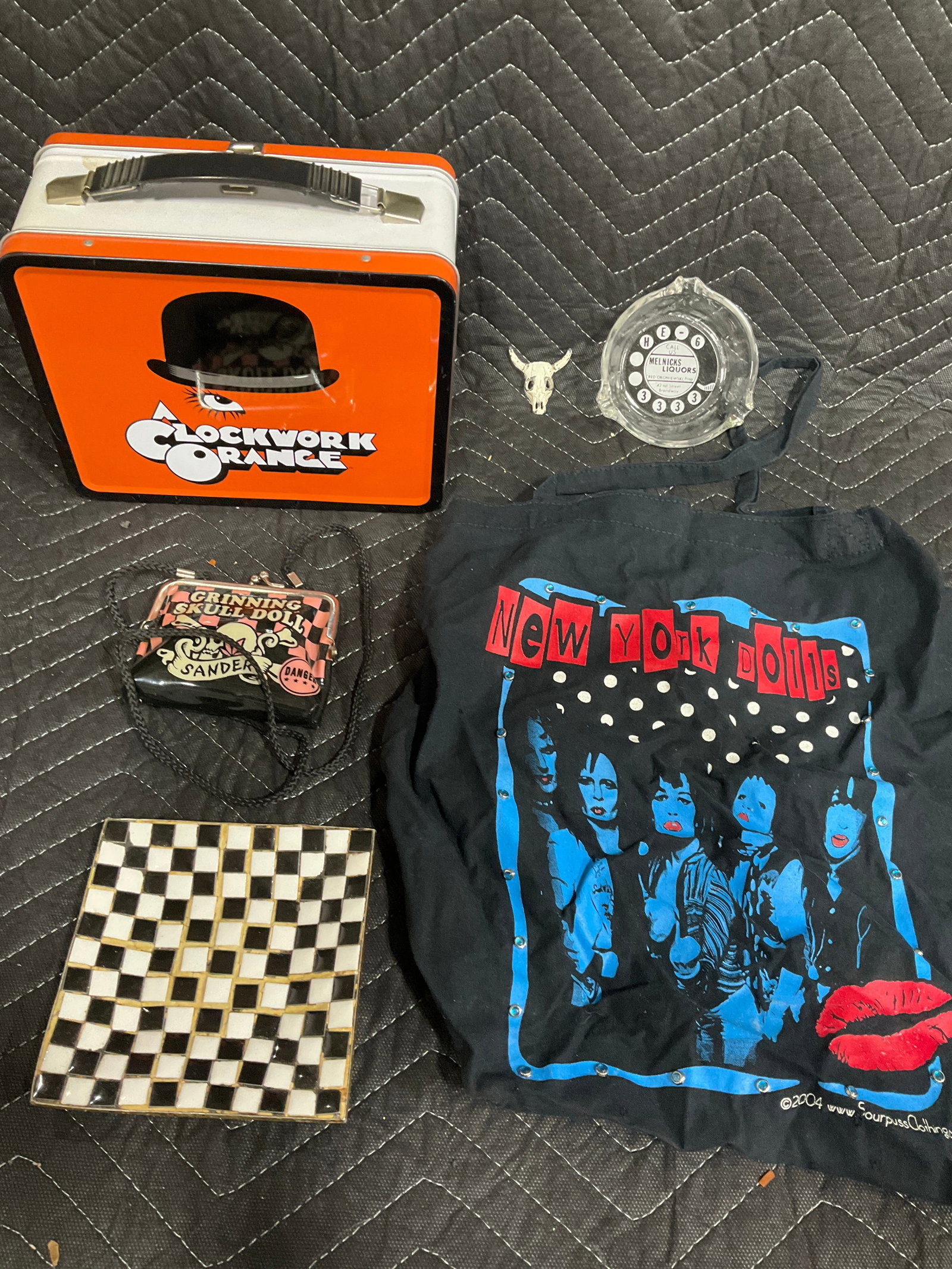 New York Dolls handbag, A Clockwork orange metal lunchbox, and more: New York Dolls handbag, A Clockwork orange metal lunchbox, and more