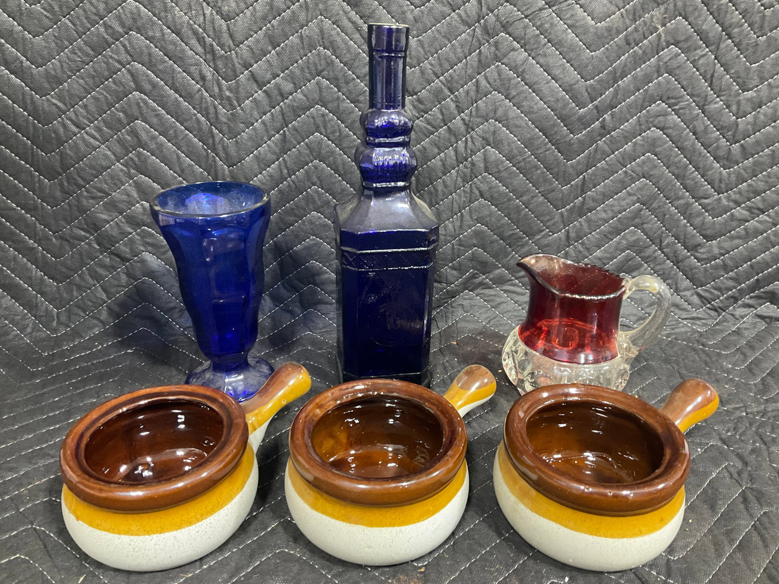 Blue Glass Bottle, Red Glass Pitcher, Stoneware Pans, and more (Tallest - 12in): Blue Glass Bottle, Red Glass Pitcher, Stoneware Pans, and more (Tallest - 12in)