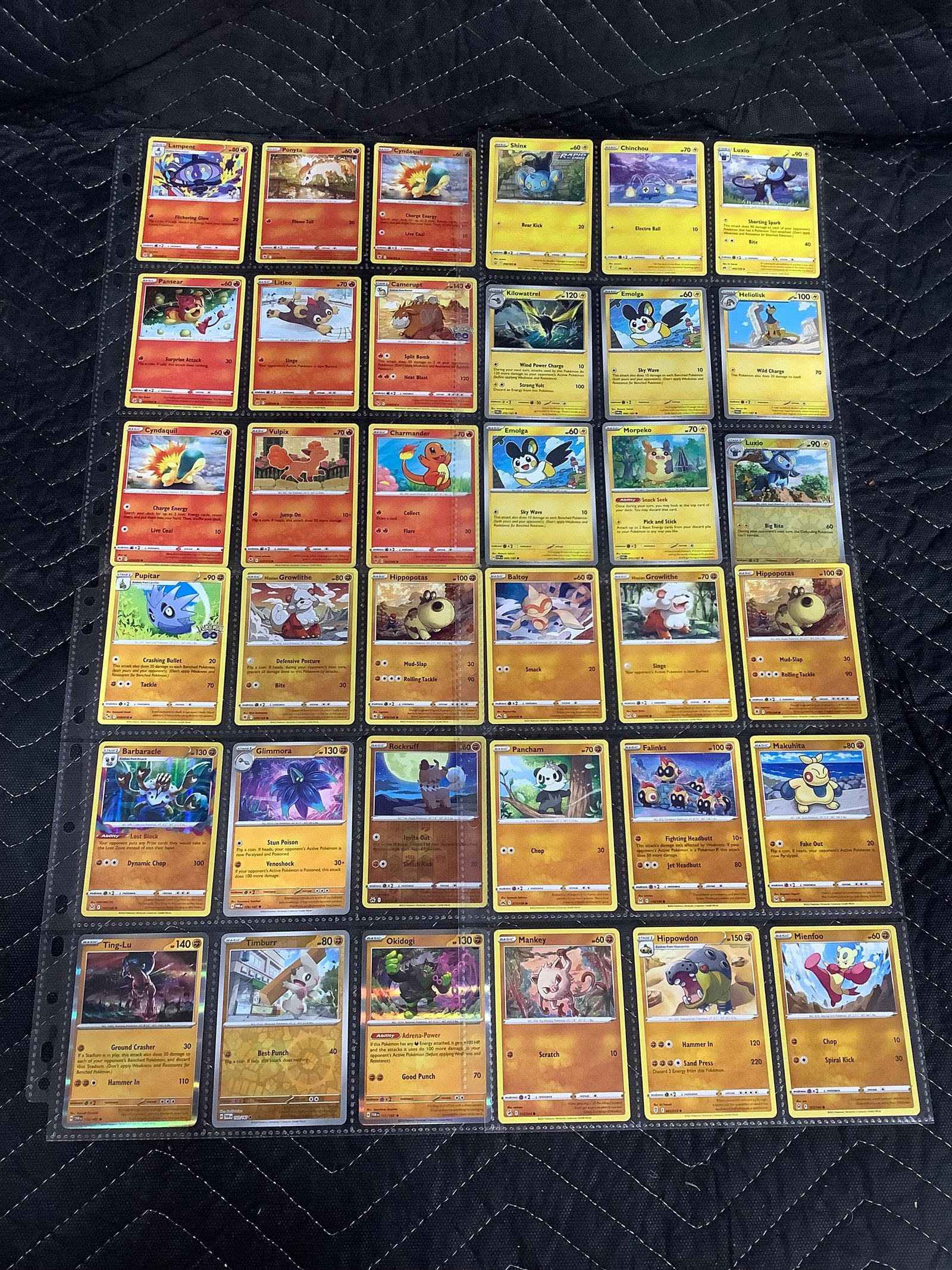 Various Pokemon cards in collector sheets: Various Pokemon cards in collector sheets