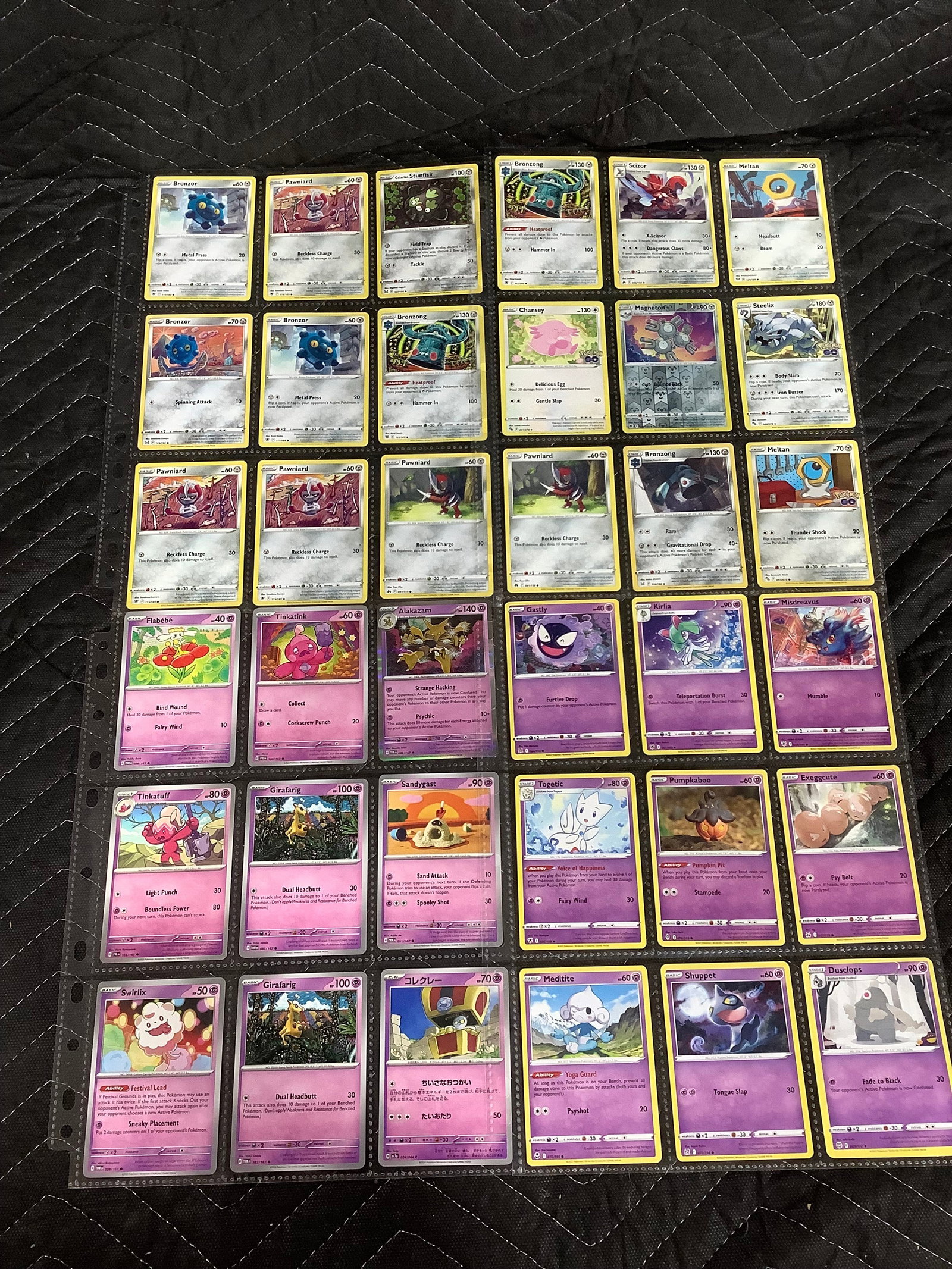 Various Pokemon cards in collector sheets: Various Pokemon cards in collector sheets