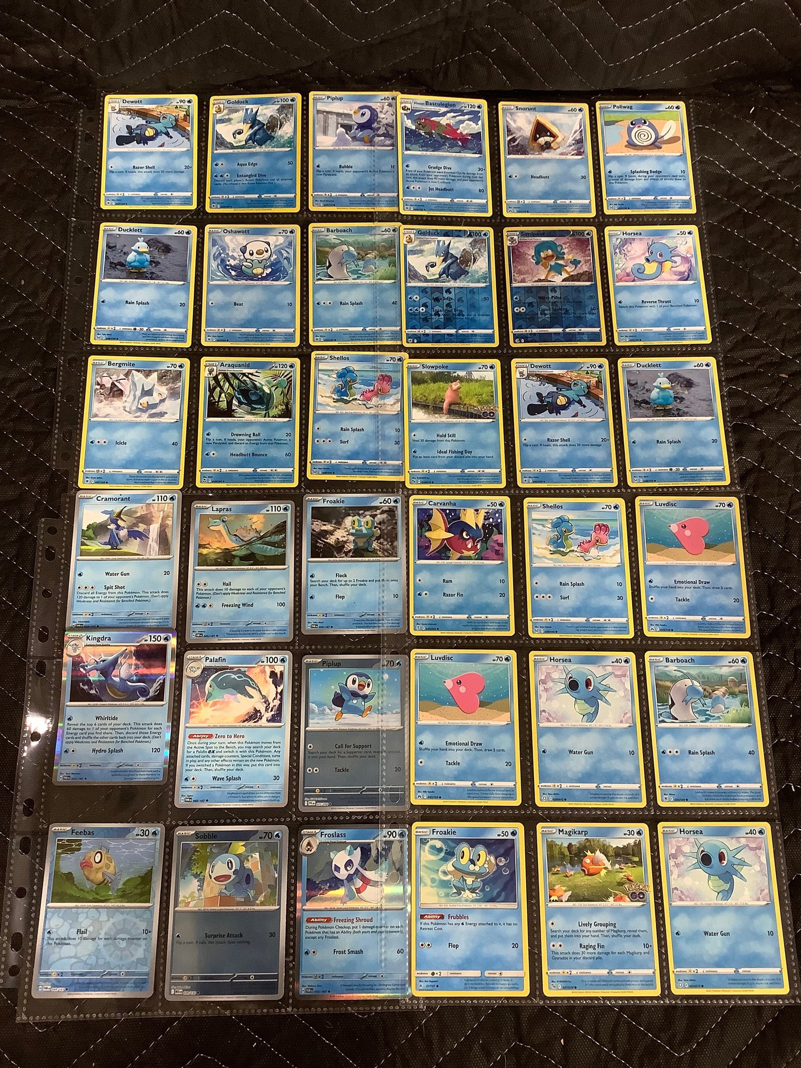 Various Pokemon cards in collector sheets (1 of 1)