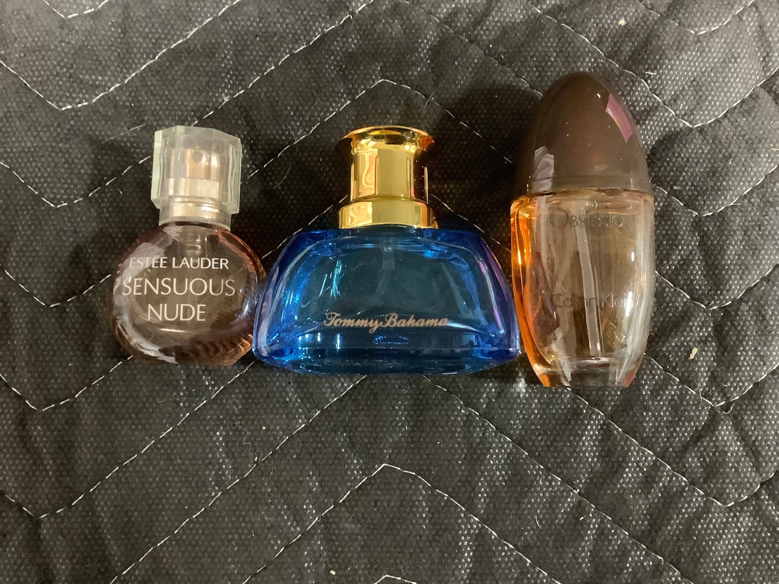Women's perfumes(Estee Lauder, Tommy Bahama, Calvin Klein-bottles mostly full) (1 of 1)