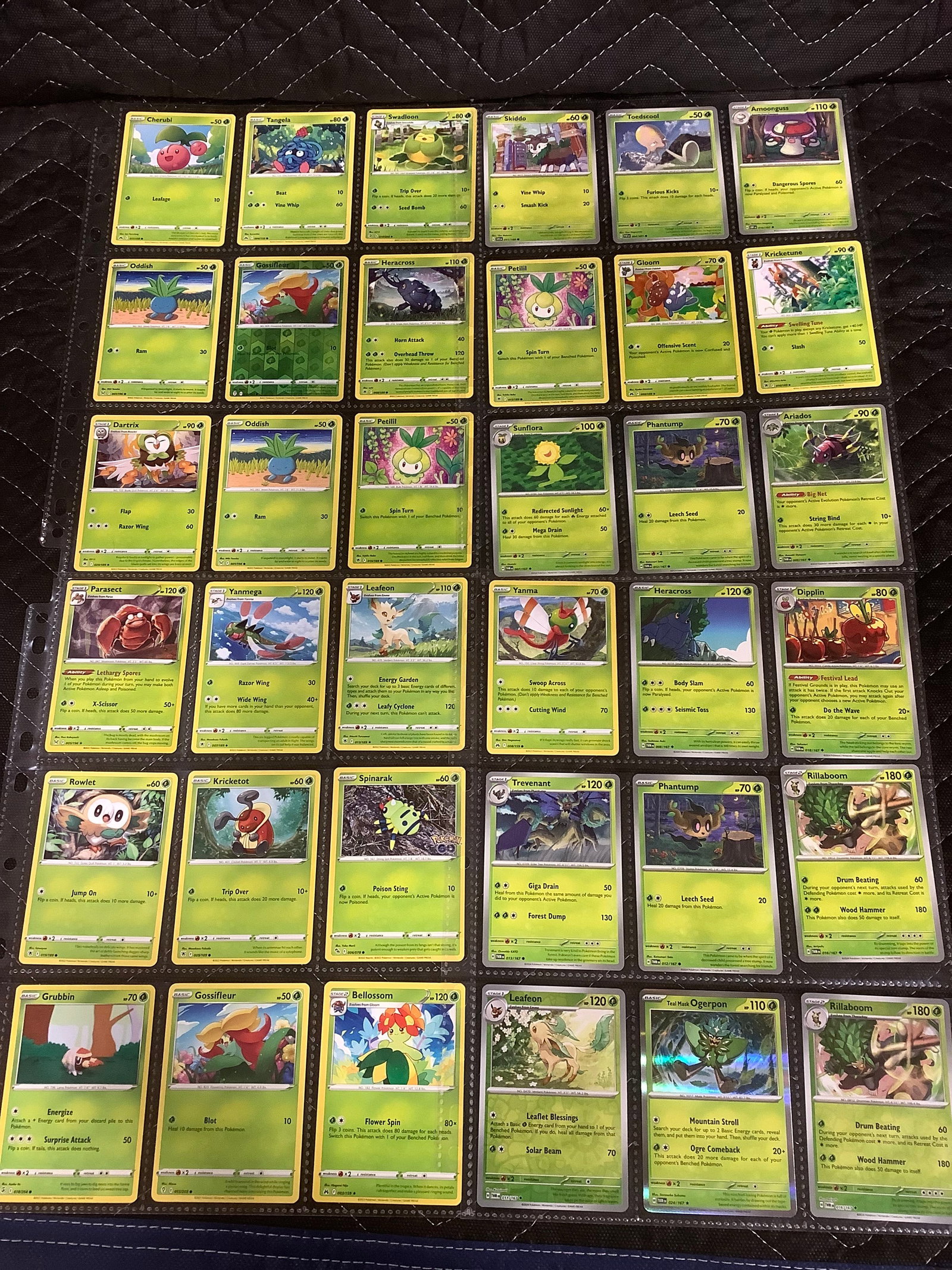 Various Pokemnon cards in collector sheets (1 of 1)