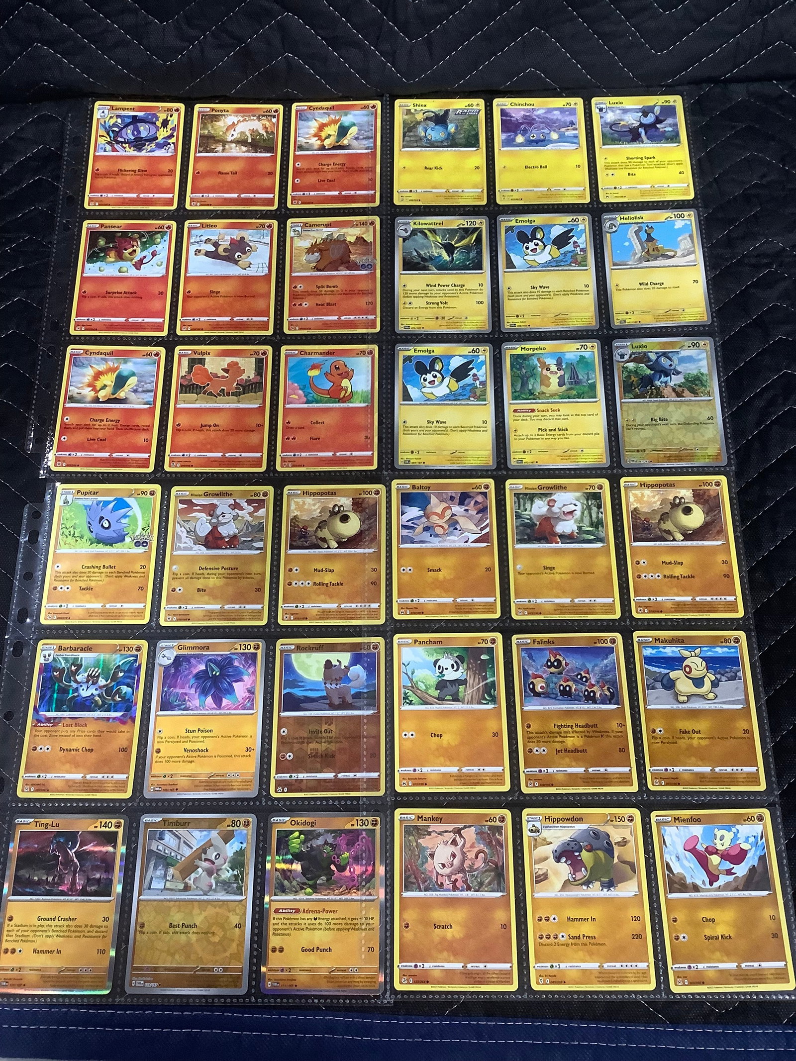 Various Pokemnon cards in collector sheets (1 of 1)