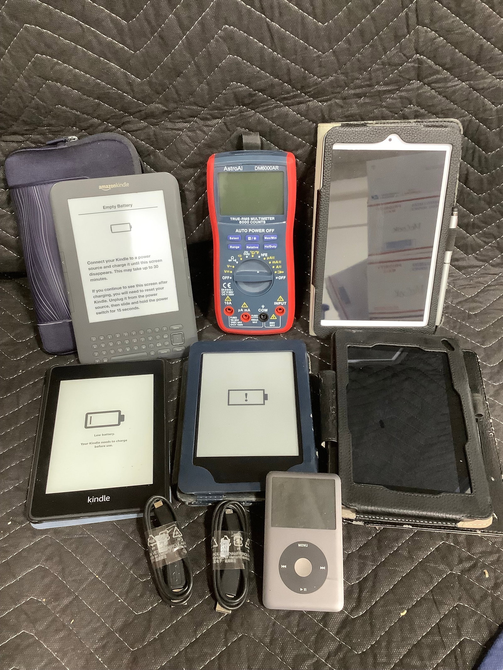 Various tablets and True-RMS multimeter(powers on) (1 of 1)