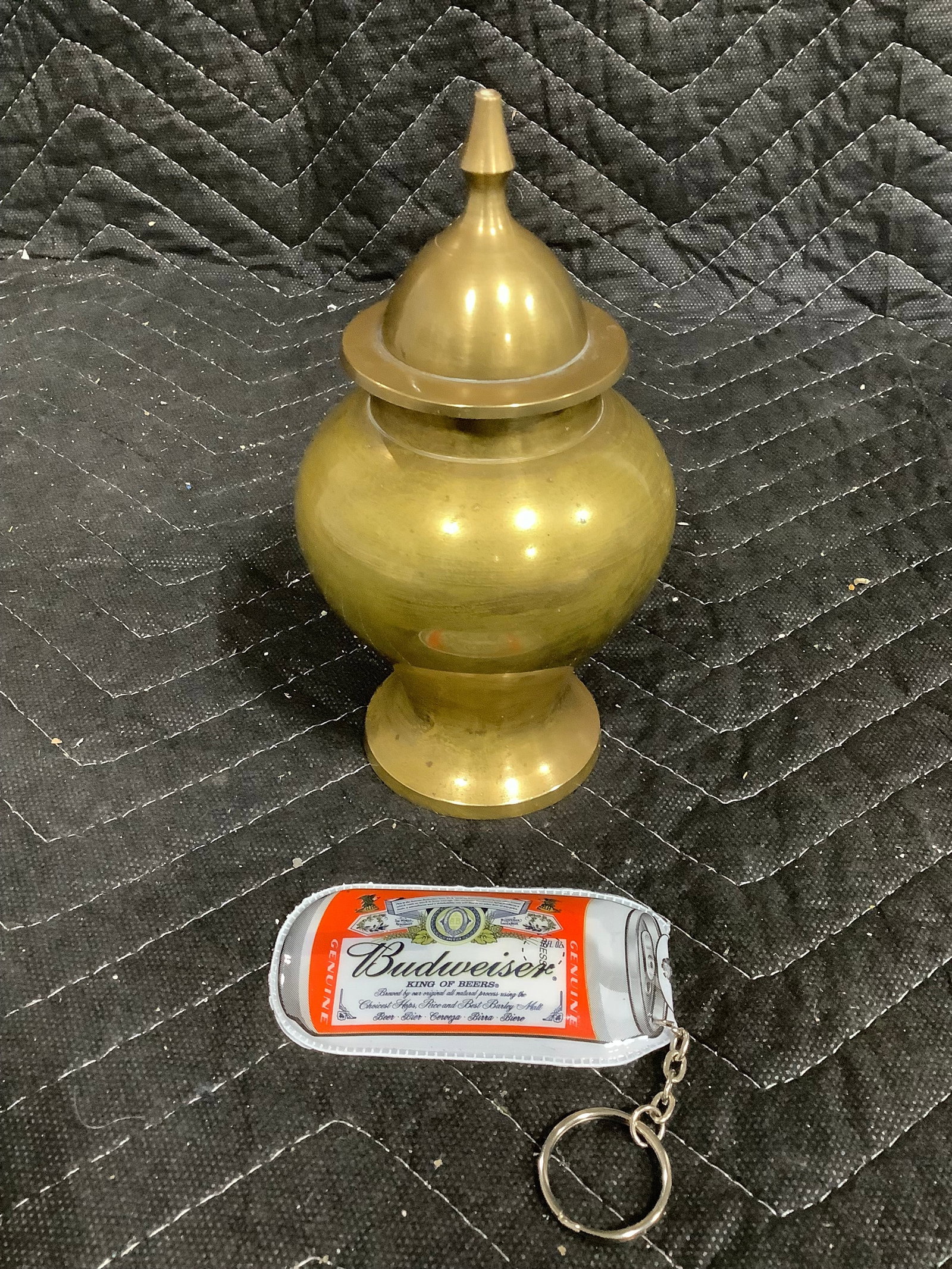 Budweiser keychain and brass urn: Budweiser keychain and brass urn