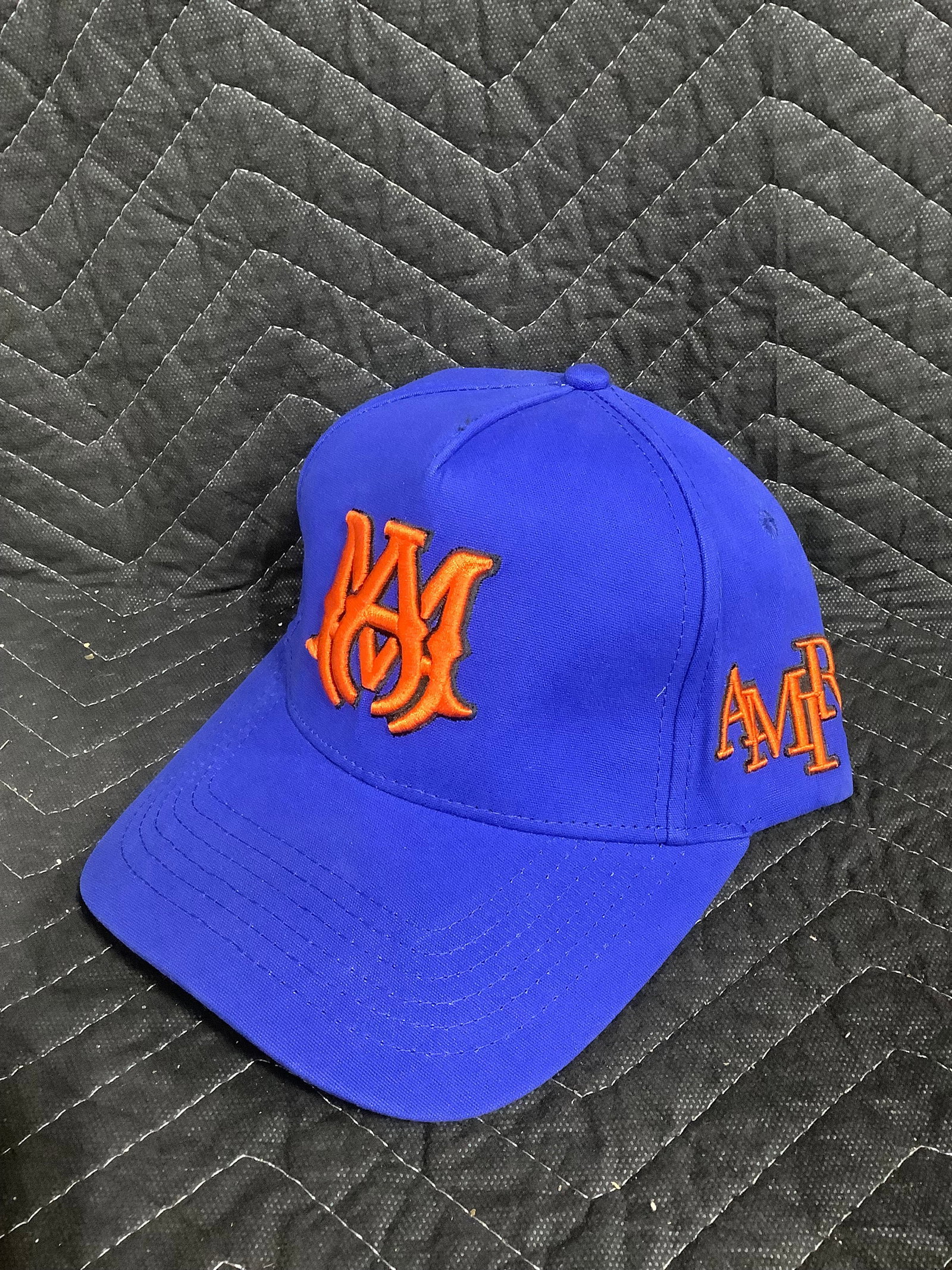 Amiri Blue and orange MA trucker hat: Amiri Blue and orange MA trucker hat