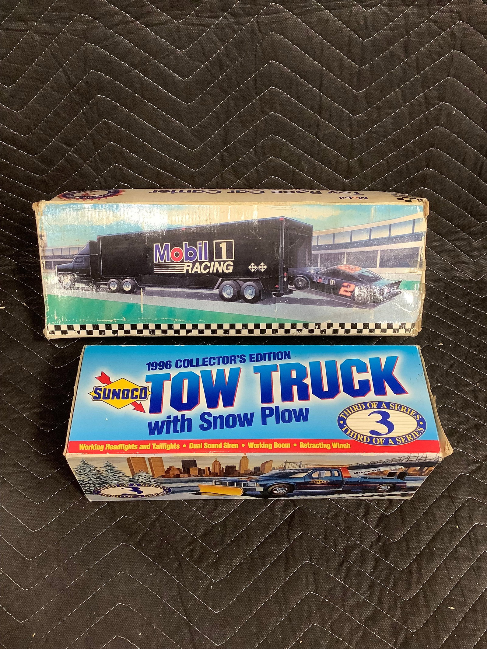Mobil 1 Toy Race Carrier and Sunoco Tow Truck collectibles in box (1 of 1)
