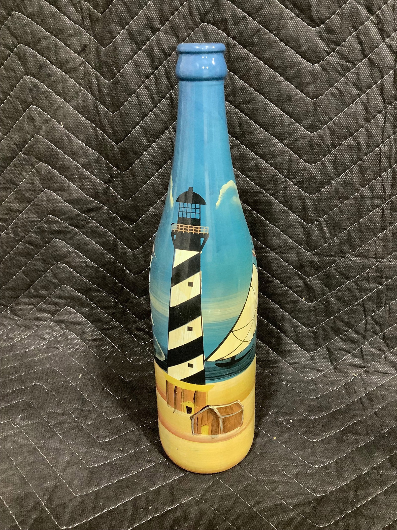 Lighthouse and sailboat glass bottle(11.5in tall): Lighthouse and sailboat glass bottle(11.5in tall)