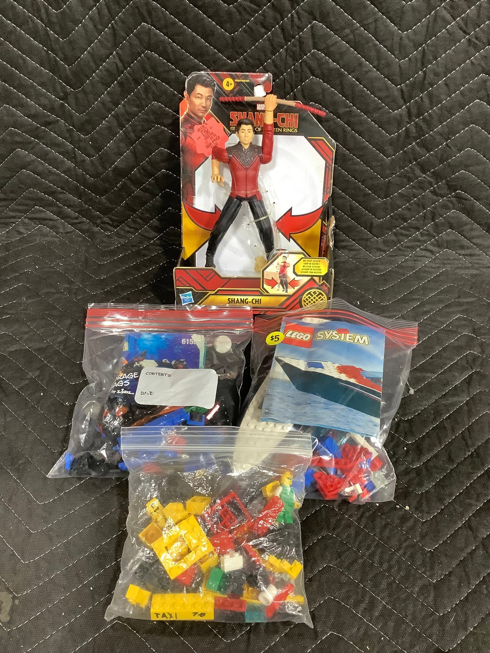 Various Lego pieces and Shan-Chi collectible figure*new in package* (1 of 1)