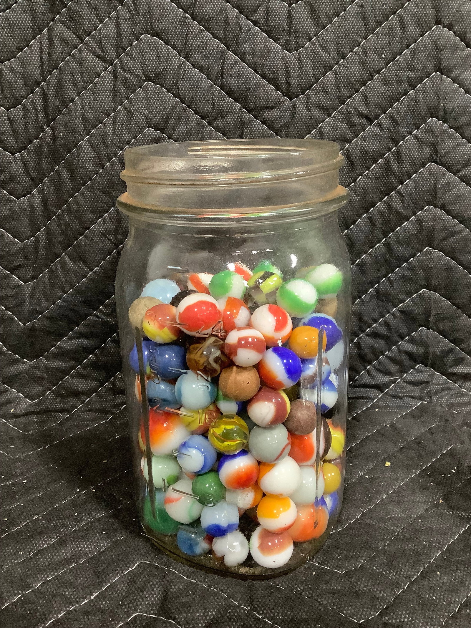 Vintage glass marbles in jar (1 of 1)