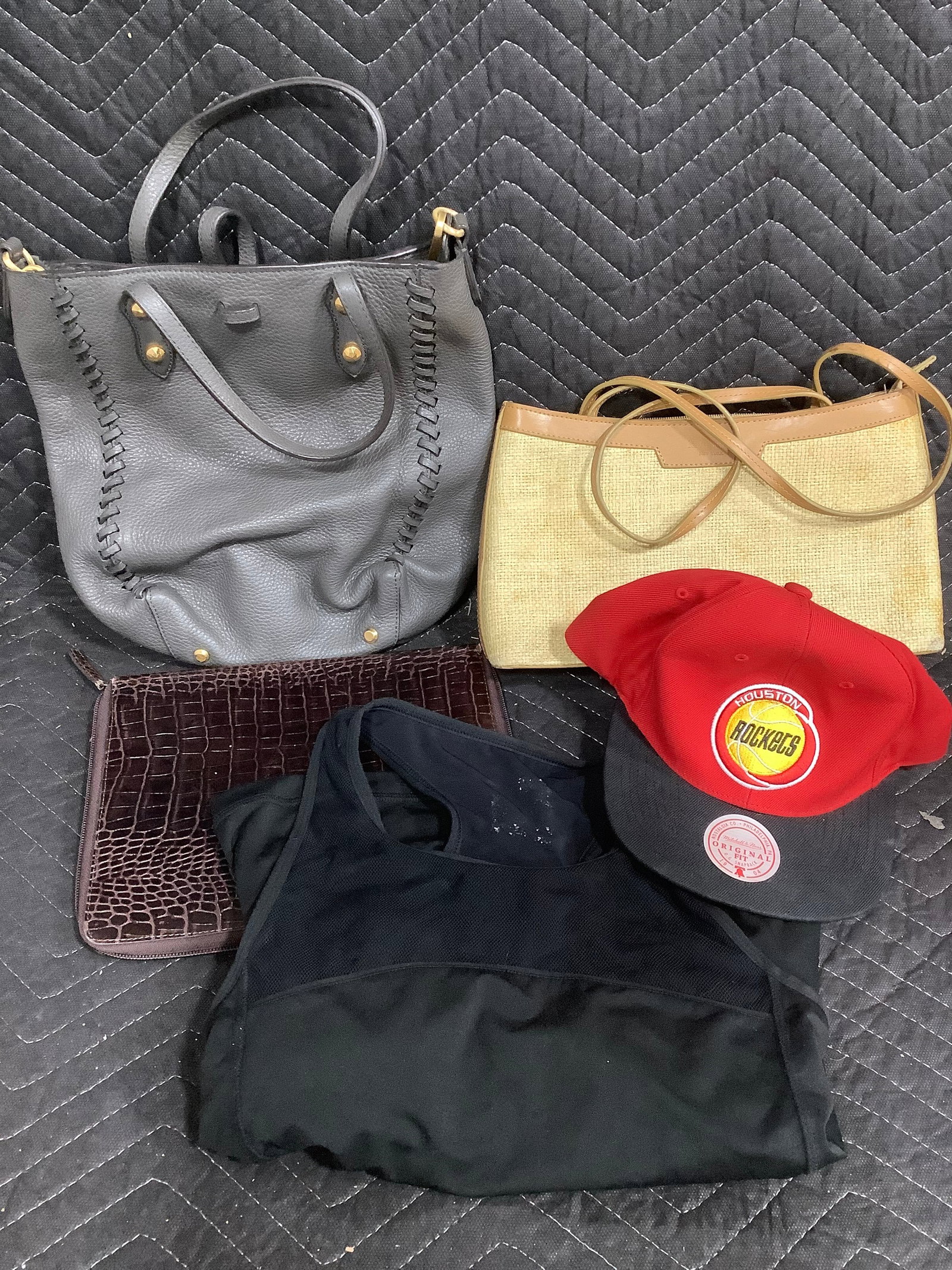 Handbags, tanktop, and Houston Rockets hat: Handbags, tanktop, and Houston Rockets hat