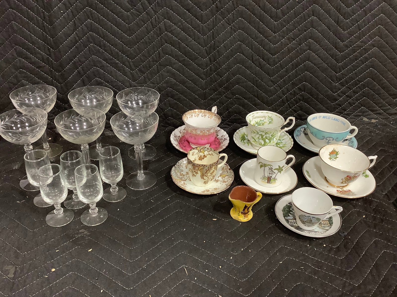 Teacups with matching dishes and drinking glasses(tallest 6in): Teacups with matching dishes and drinking glasses(tallest 6in)