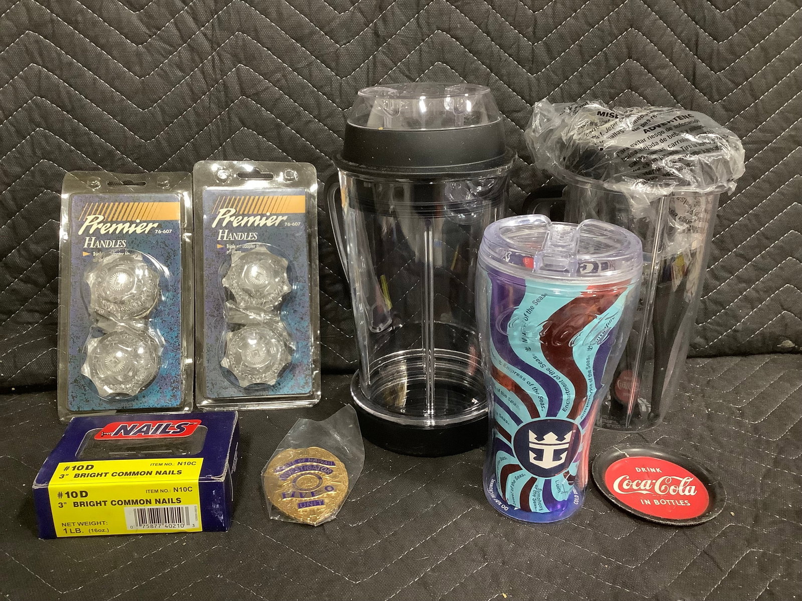 Coca Cola cup, personal blender cup, state of Hawaii investigator badge, and more: Coca Cola cup, personal blender cup, state of Hawaii investigator badge, and more
