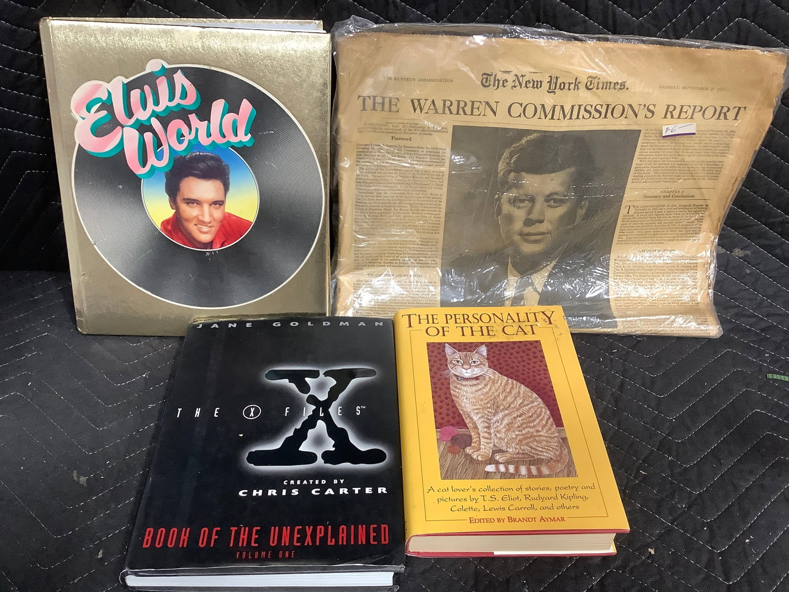 Hardcover books and vintage newspaper (1 of 1)