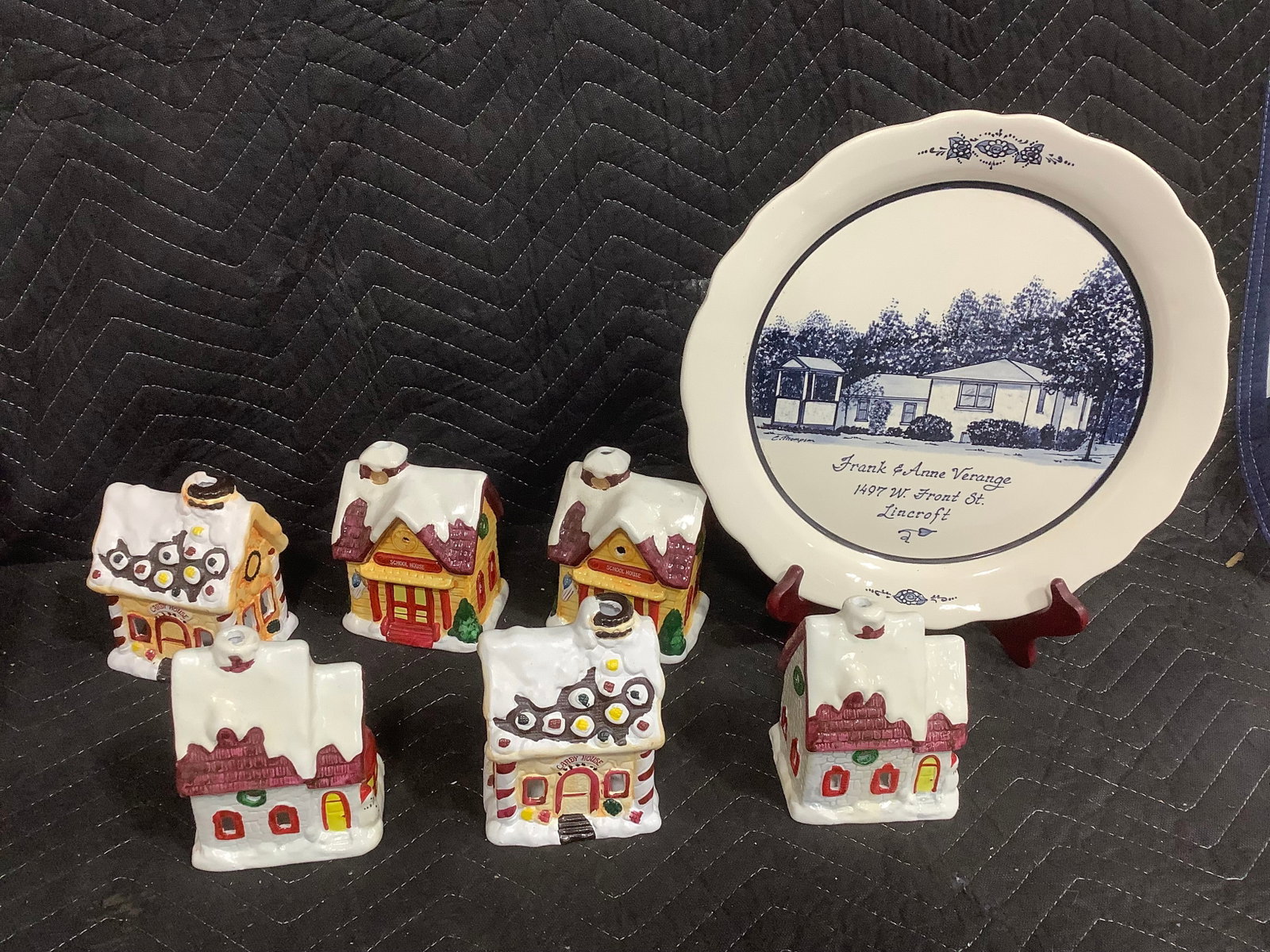 St. Lincroft Frank & Anne Verange commemorative plate, display stand, and ceramic christmas village: St. Lincroft Frank & Anne Verange commemorative plate, display stand, and ceramic christmas village tea light candleholders(13in long)