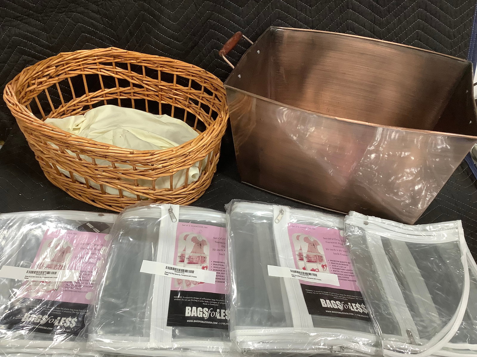 Storage baskets(largest 22in handle to handle) and garment bags: Storage baskets(largest 22in handle to handle) and garment bags